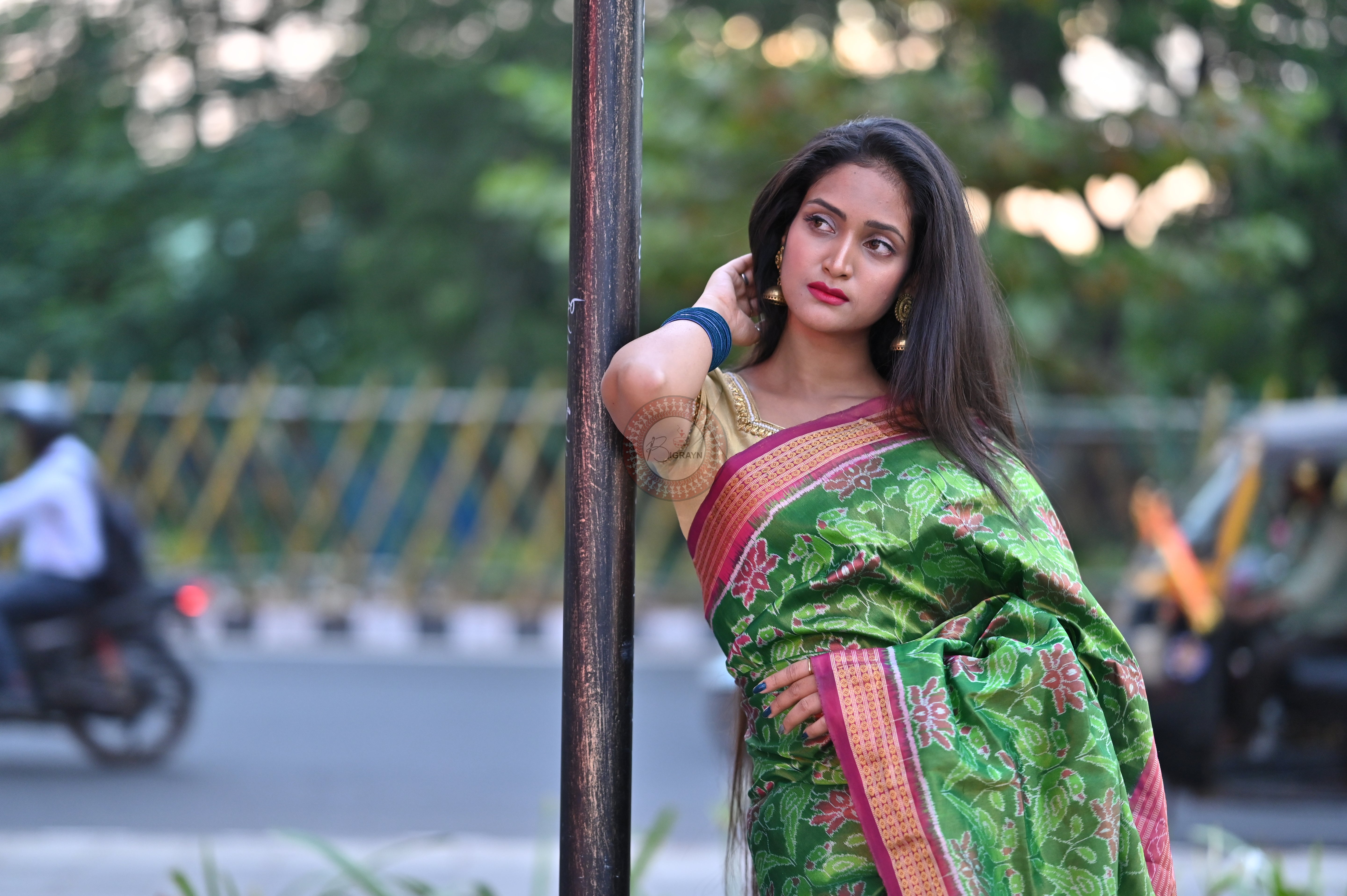 "Odisha Handloom Tissue Silk Saree with shimmering texture, elegant zari border, and lightweight drape, handcrafted by artisans"