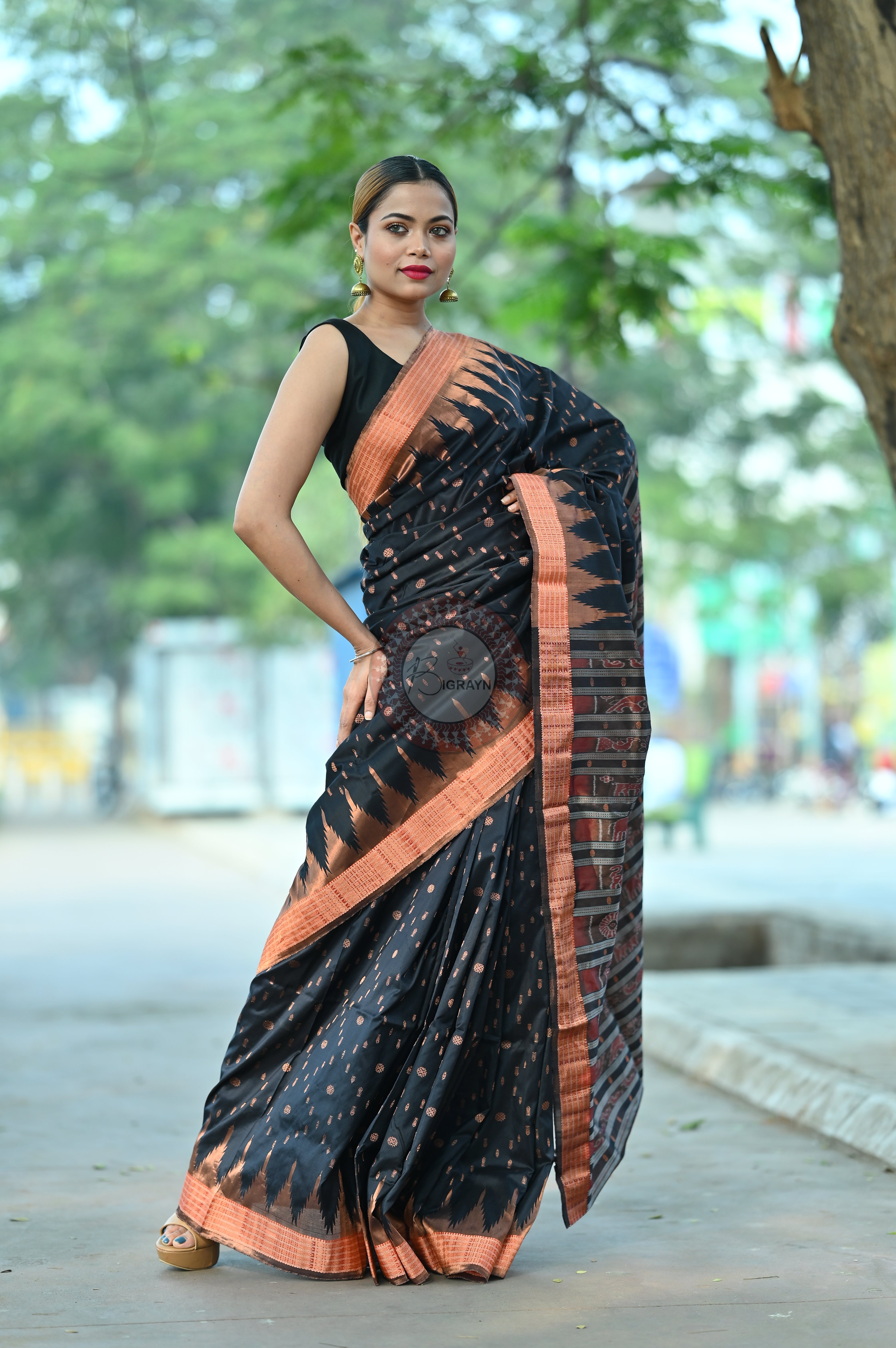 "Odisha Handloom Tissue Silk Saree with shimmering texture, elegant zari border, and lightweight drape, handcrafted by artisans"