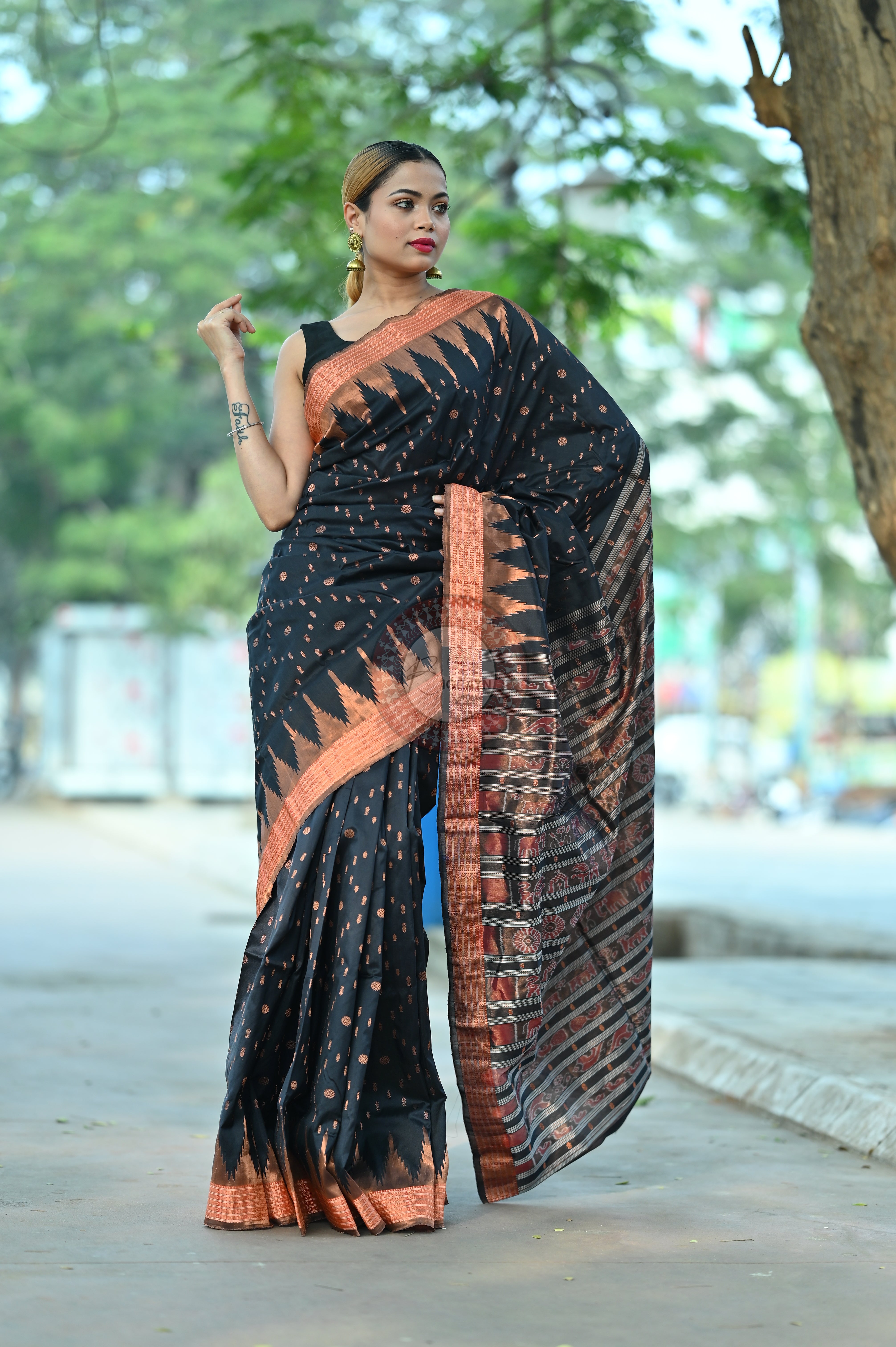 "Odisha Handloom Tissue Silk Saree with shimmering texture, elegant zari border, and lightweight drape, handcrafted by artisans"