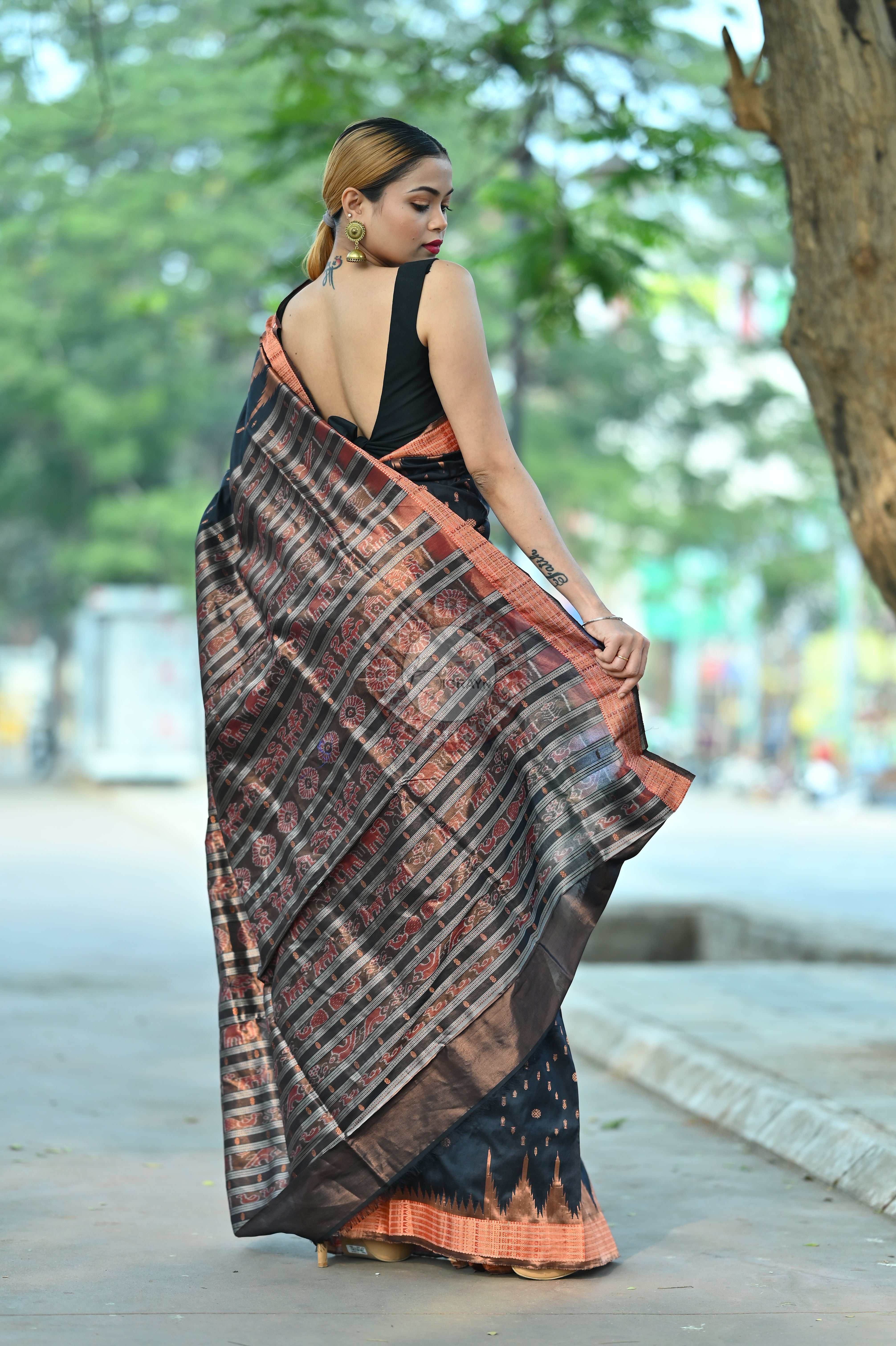"Odisha Handloom Tissue Silk Saree with shimmering texture, elegant zari border, and lightweight drape, handcrafted by artisans"