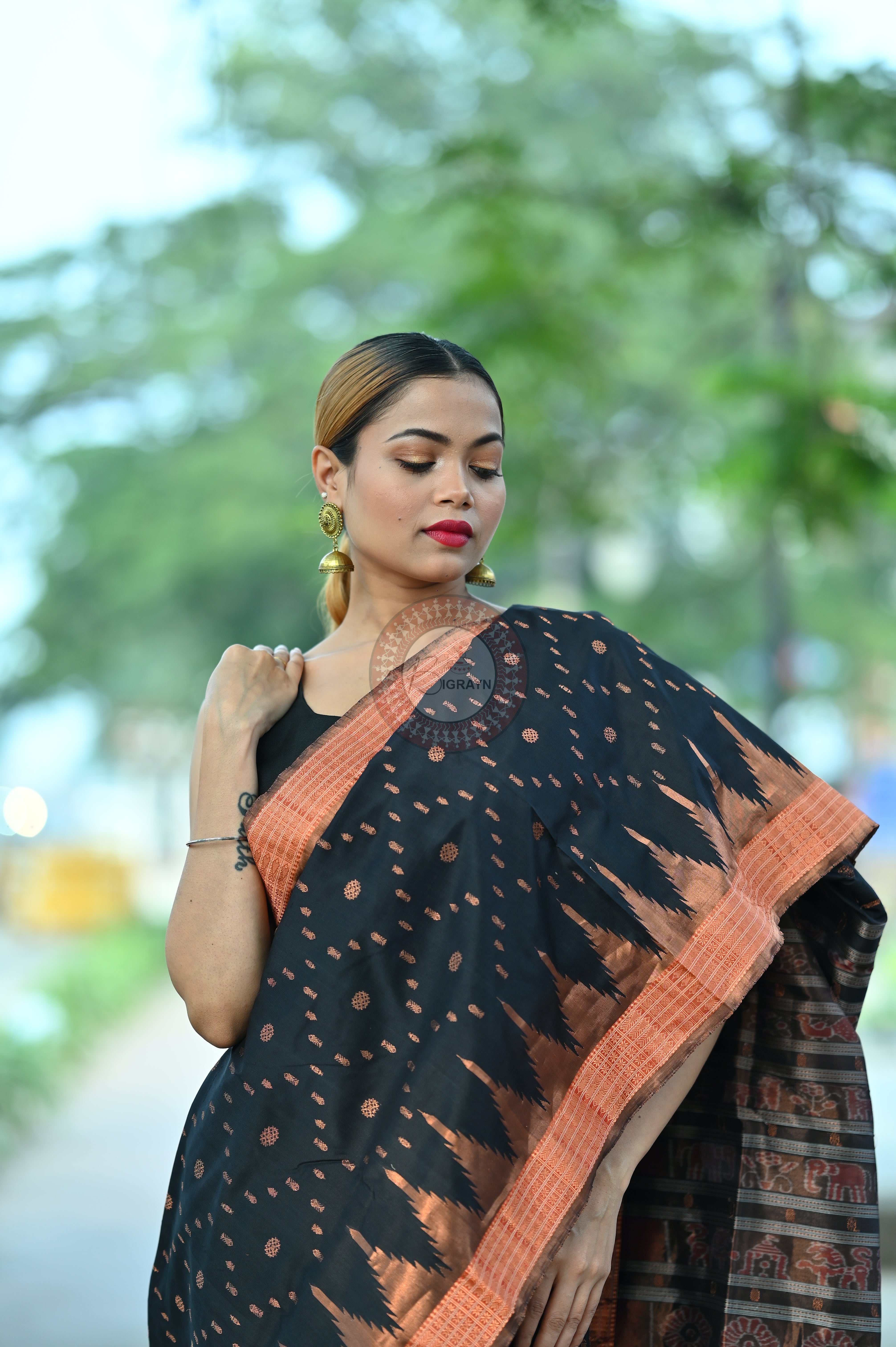 "Odisha Handloom Tissue Silk Saree with shimmering texture, elegant zari border, and lightweight drape, handcrafted by artisans"