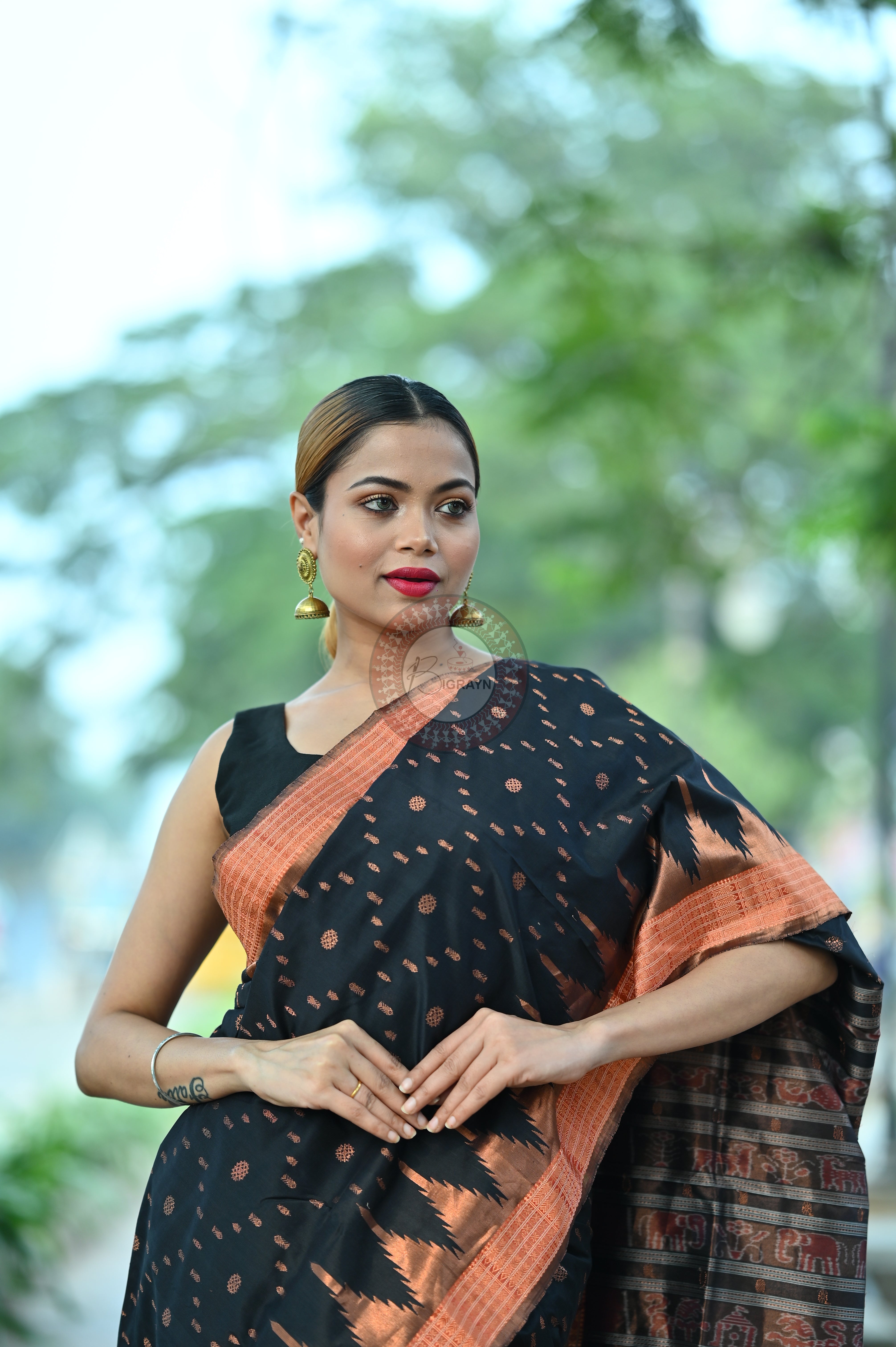 "Odisha Handloom Tissue Silk Saree with shimmering texture, elegant zari border, and lightweight drape, handcrafted by artisans"