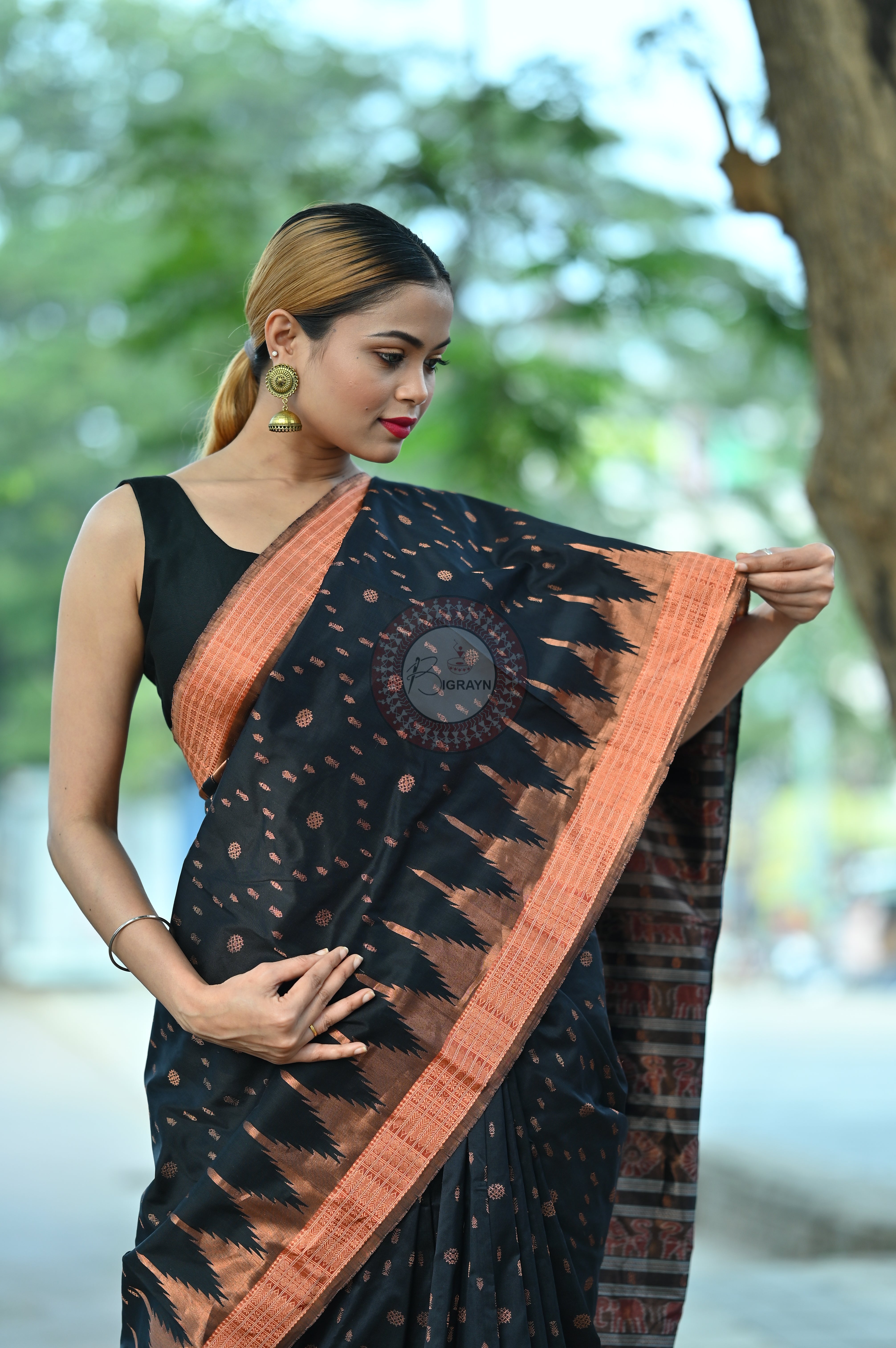 "Odisha Handloom Tissue Silk Saree with shimmering texture, elegant zari border, and lightweight drape, handcrafted by artisans"