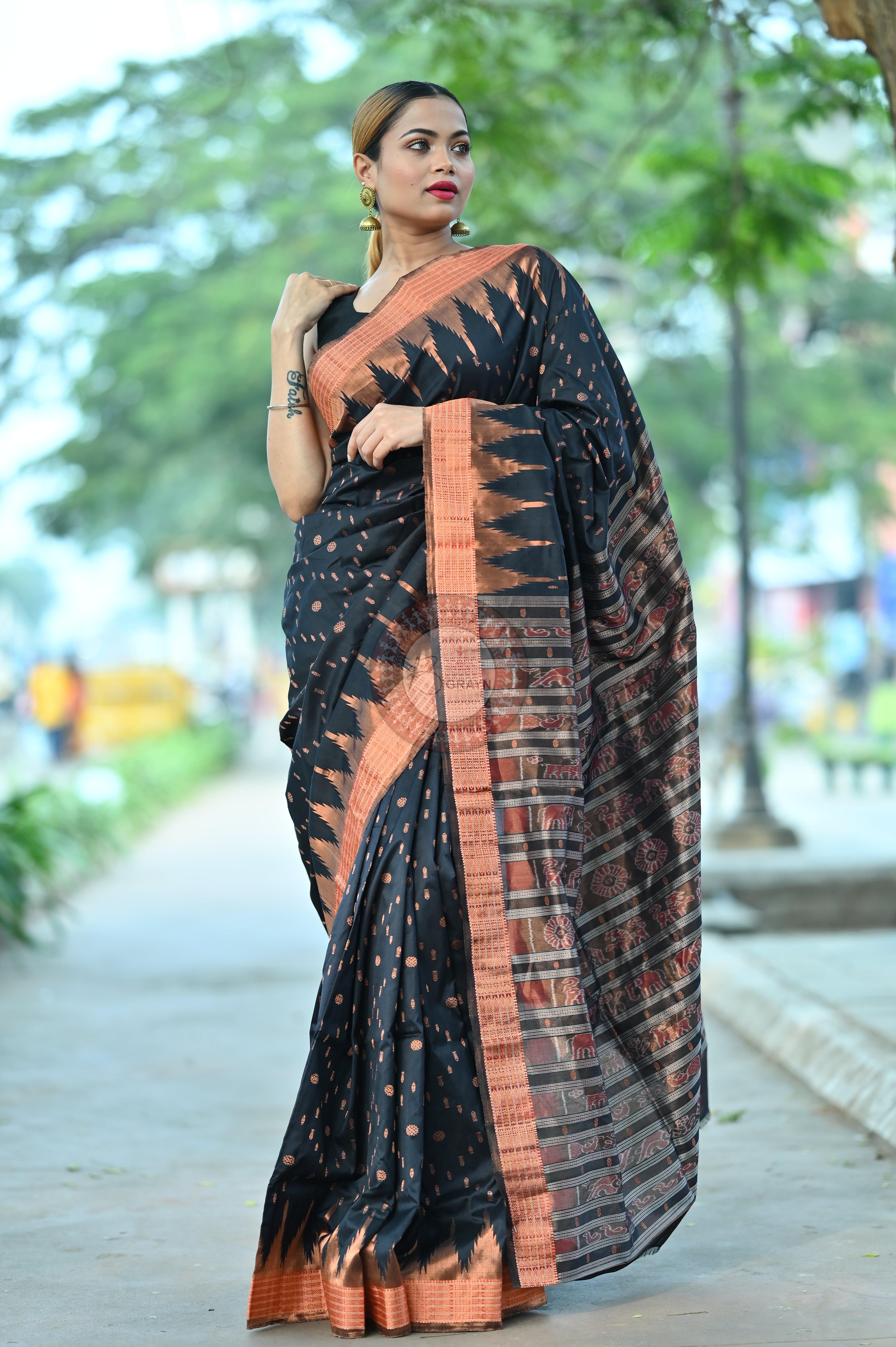 "Odisha Handloom Tissue Silk Saree with shimmering texture, elegant zari border, and lightweight drape, handcrafted by artisans"