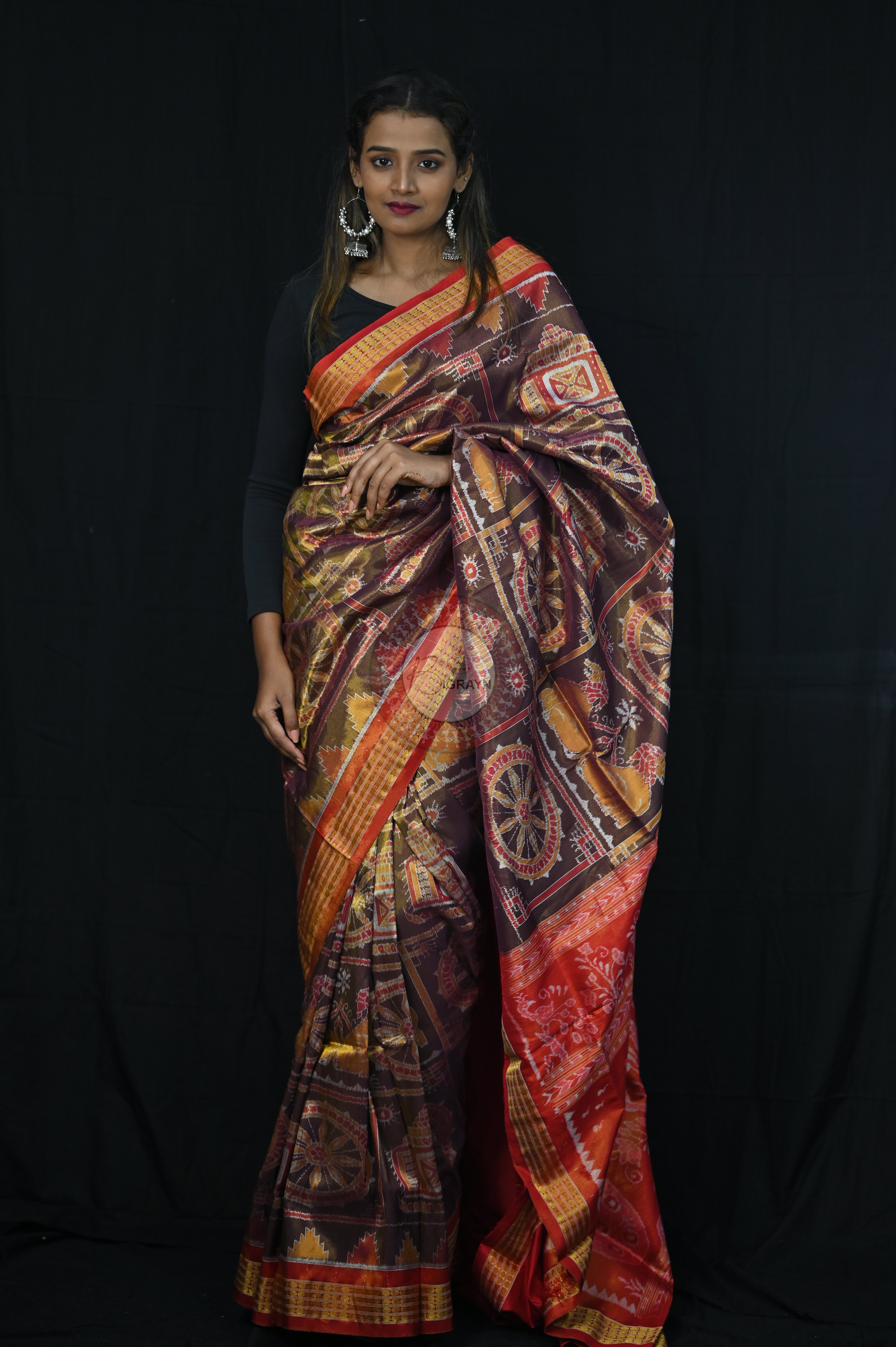 "Odisha Handloom Tissue Silk Saree with shimmering texture, elegant zari border, and lightweight drape, handcrafted by artisans"