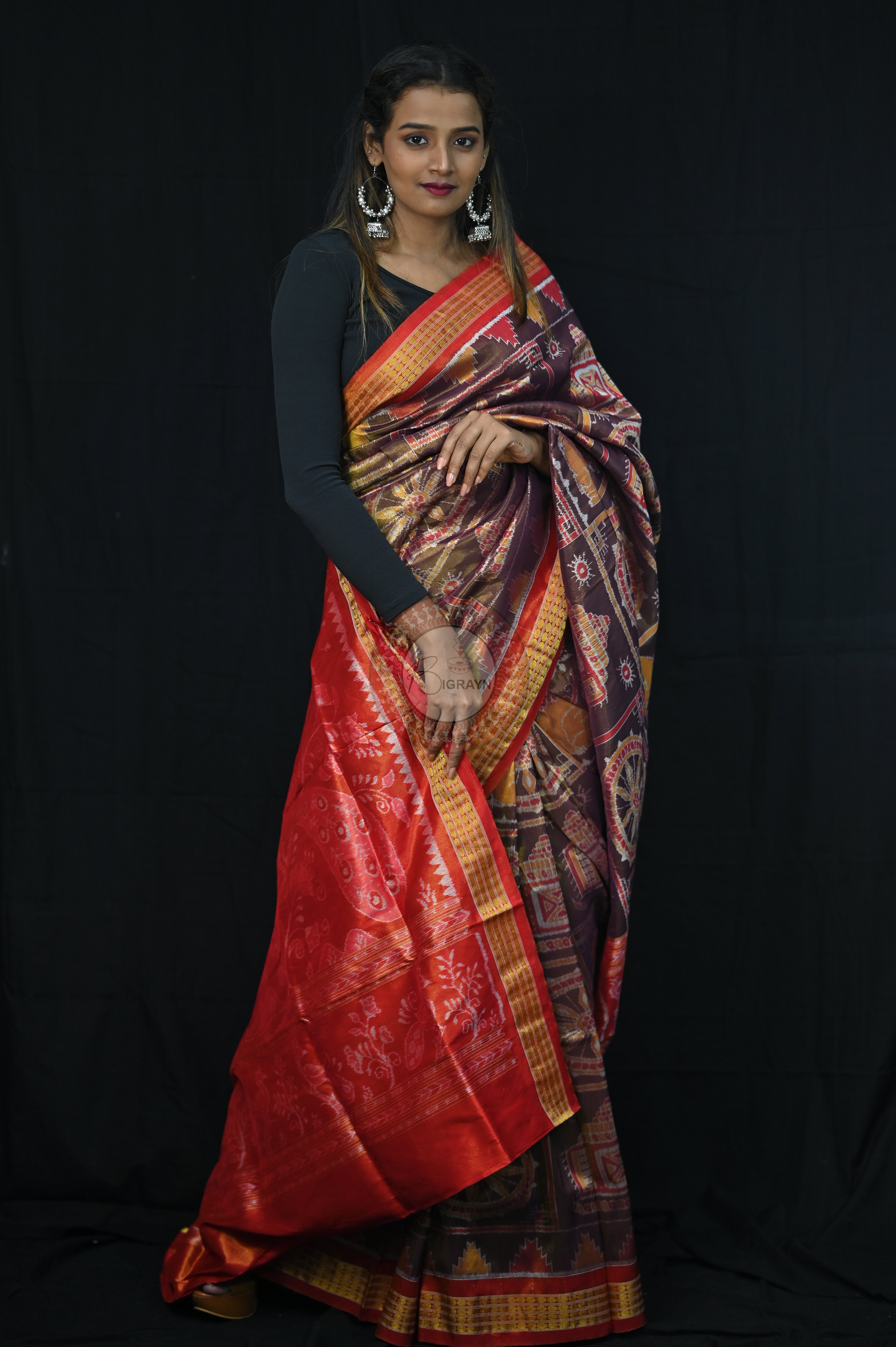 "Odisha Handloom Tissue Silk Saree with shimmering texture, elegant zari border, and lightweight drape, handcrafted by artisans"