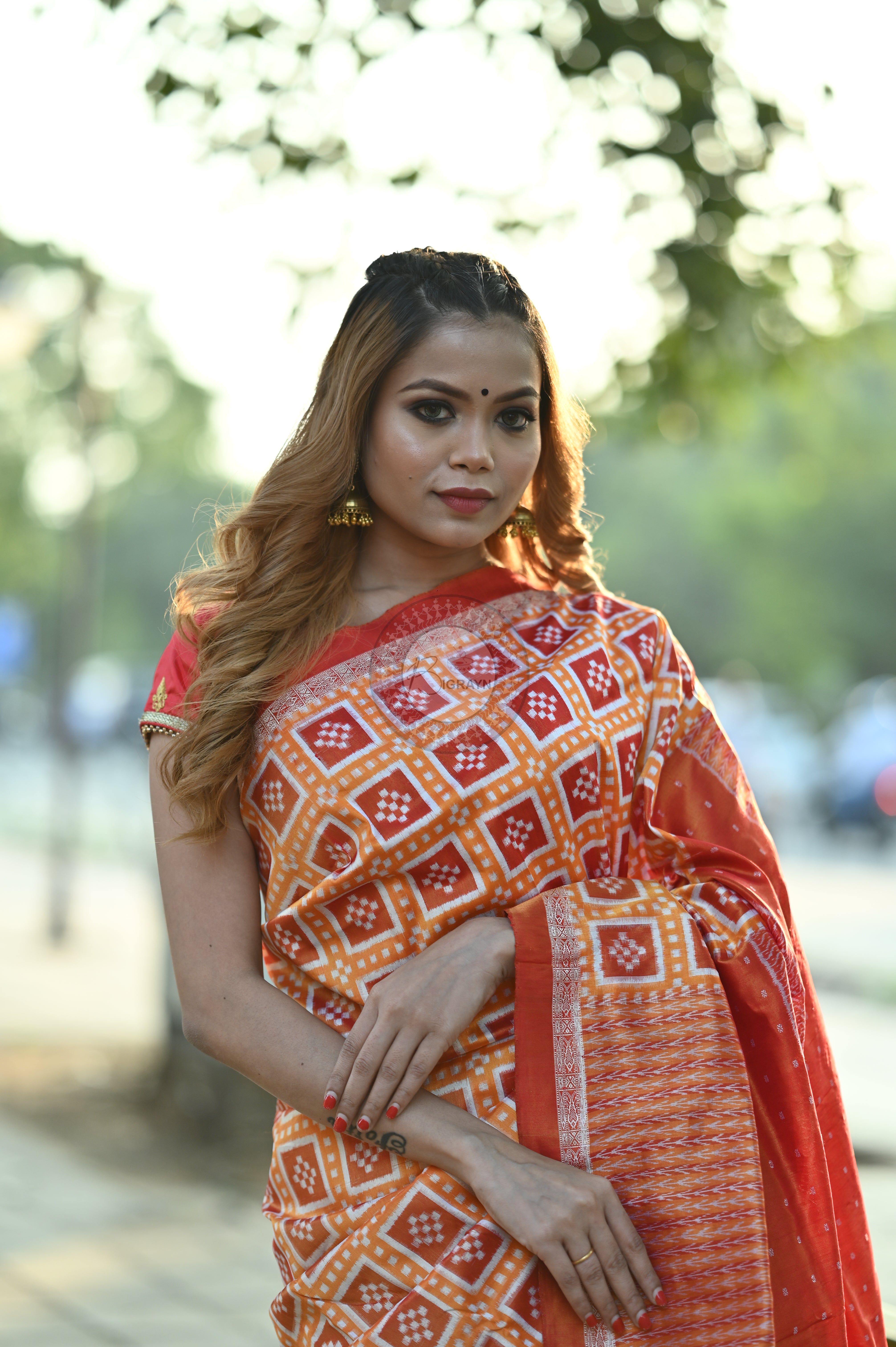"Odisha Handloom Tissue Silk Saree with shimmering texture, elegant zari border, and lightweight drape, handcrafted by artisans"