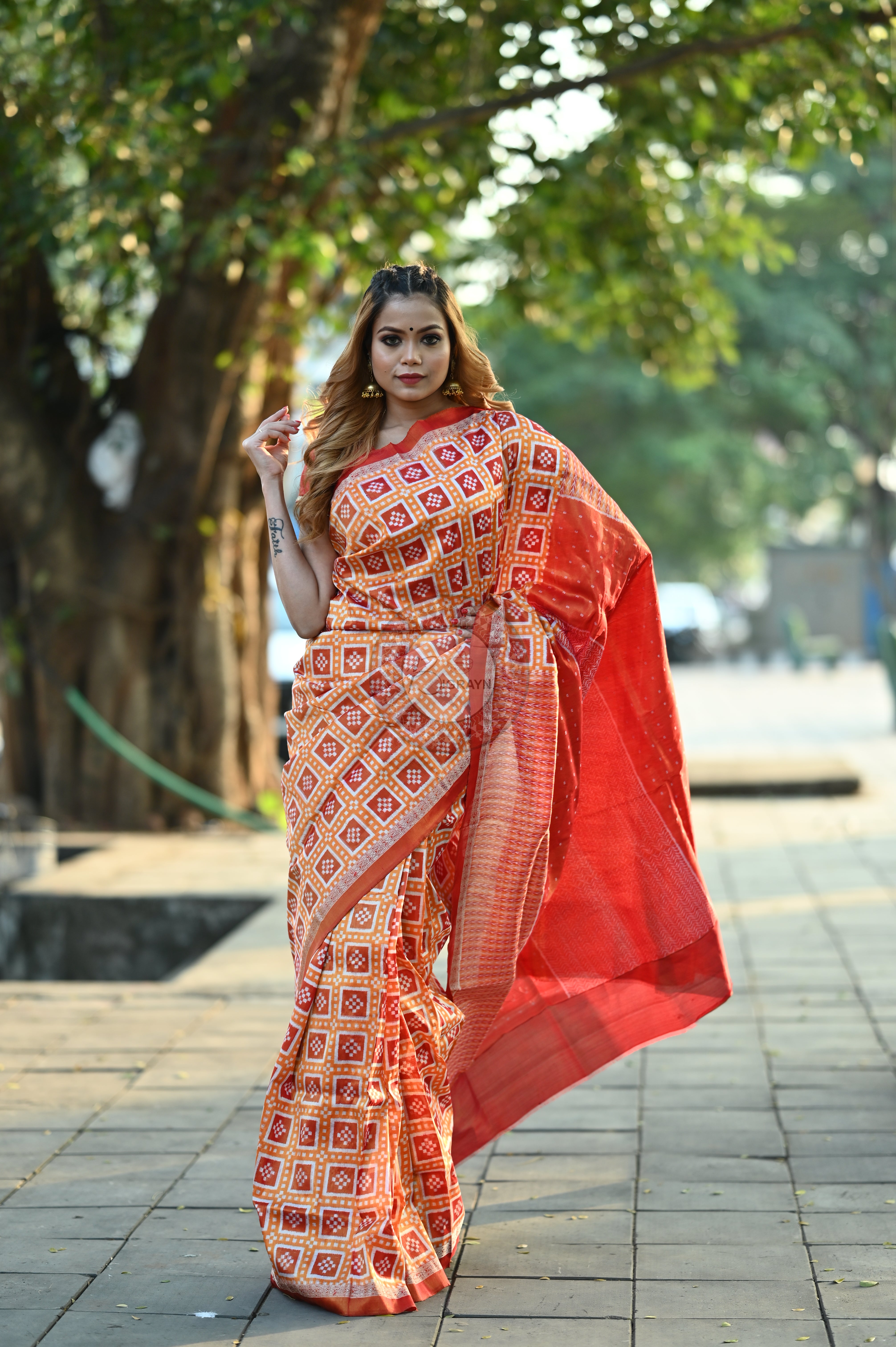 "Odisha Handloom Tissue Silk Saree with shimmering texture, elegant zari border, and lightweight drape, handcrafted by artisans"