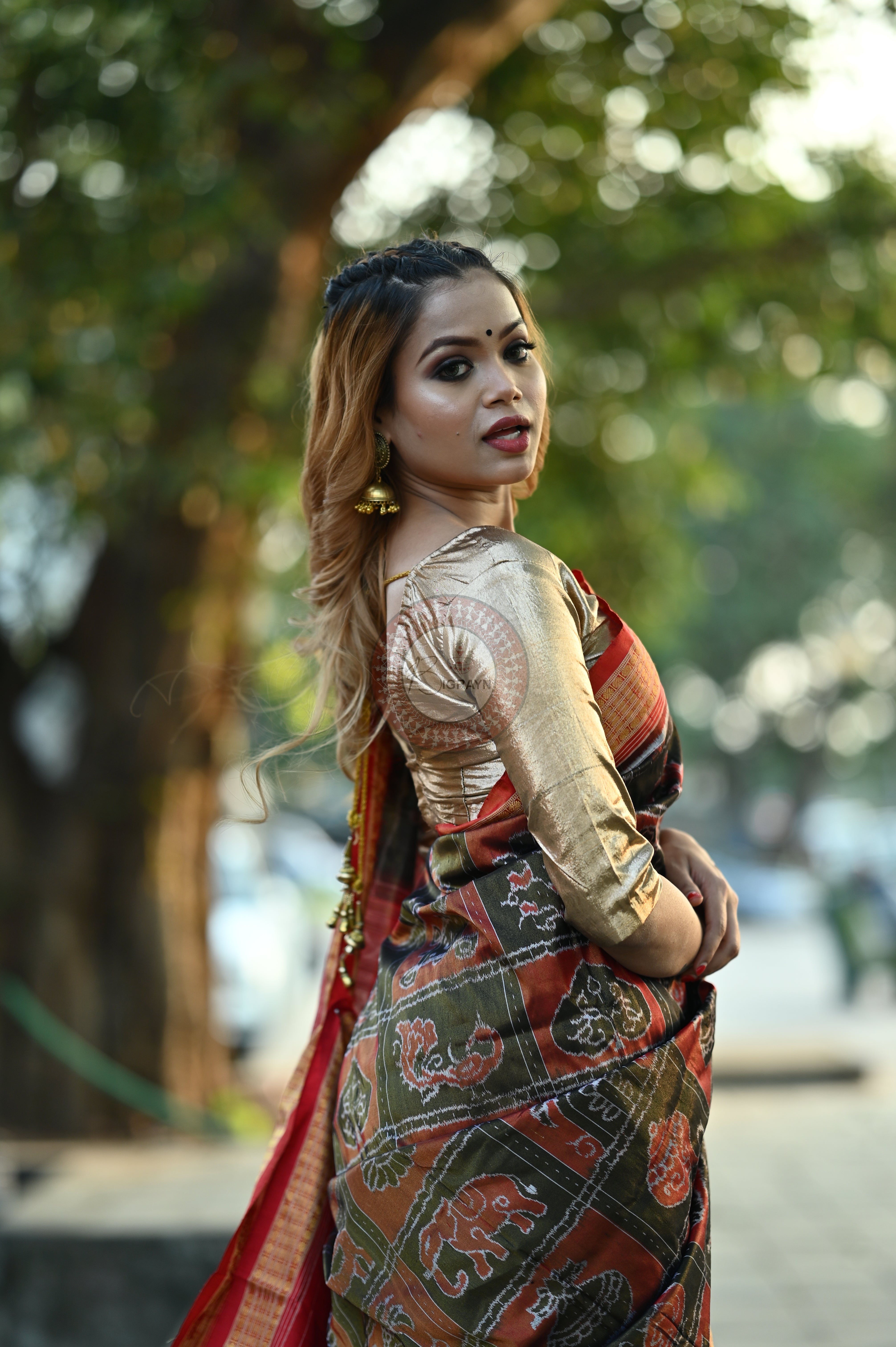 "Odisha Handloom Tissue Silk Saree with shimmering texture, elegant zari border, and lightweight drape, handcrafted by artisans"