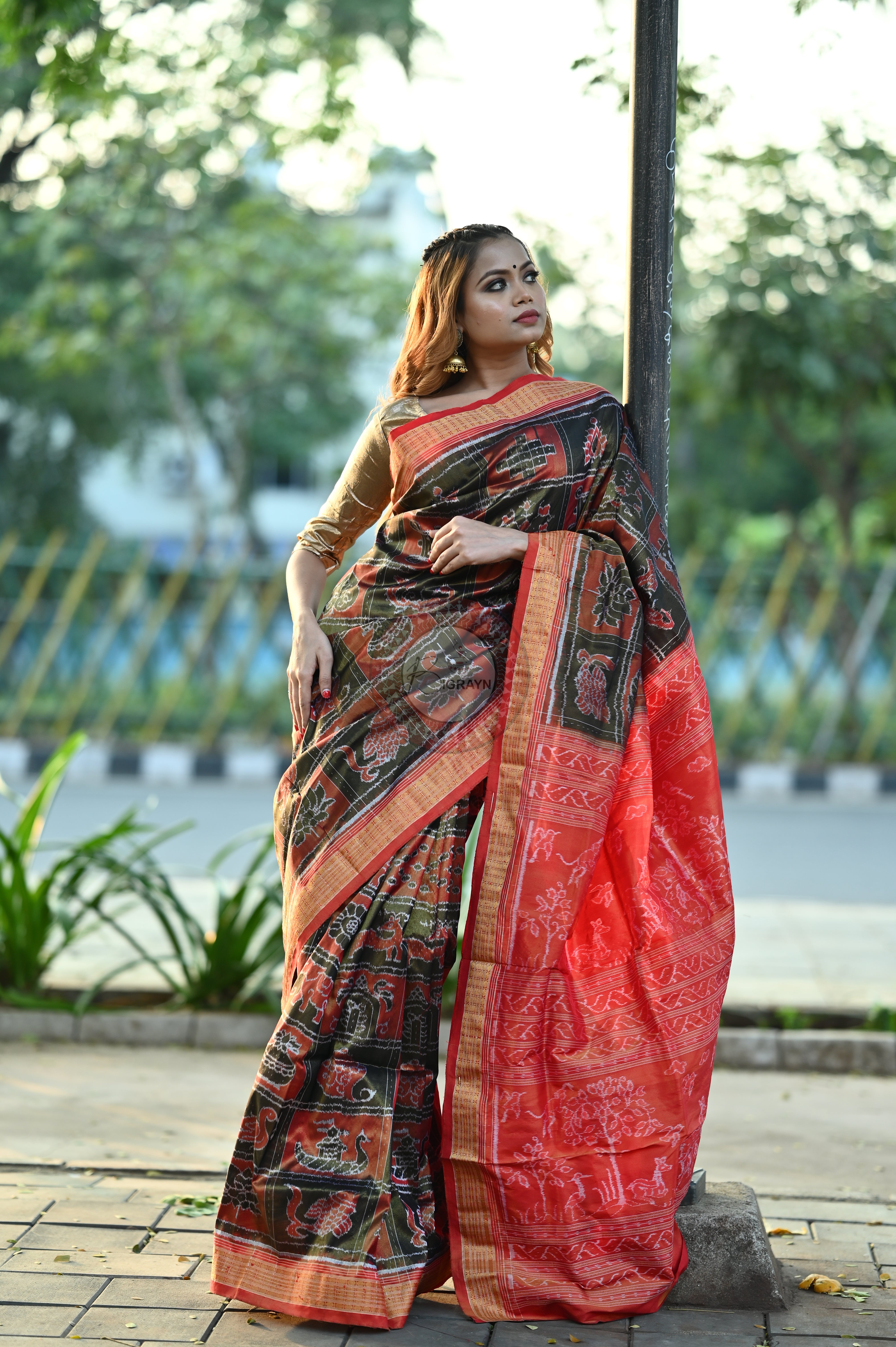 "Odisha Handloom Tissue Silk Saree with shimmering texture, elegant zari border, and lightweight drape, handcrafted by artisans"