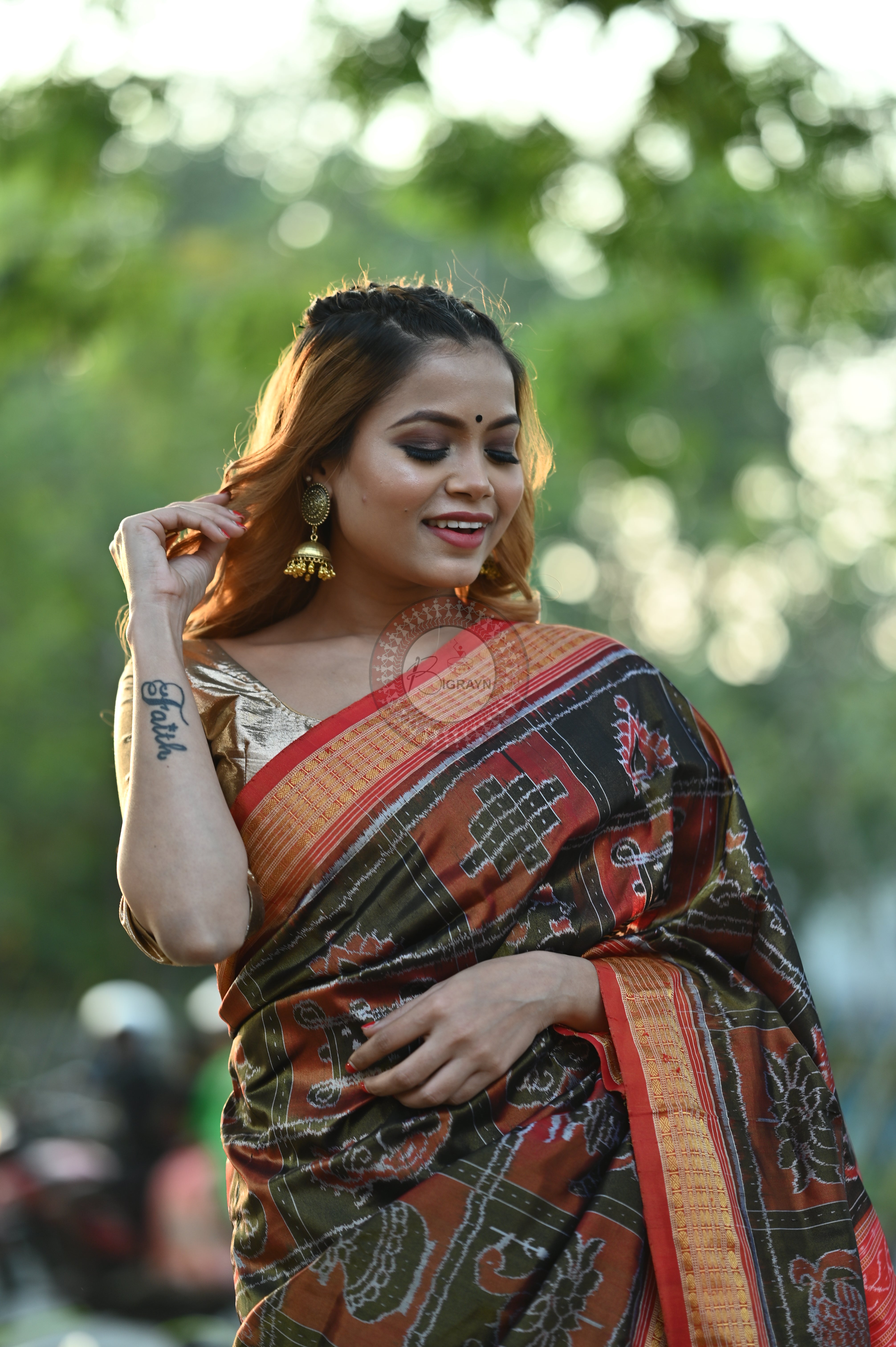 "Odisha Handloom Tissue Silk Saree with shimmering texture, elegant zari border, and lightweight drape, handcrafted by artisans"