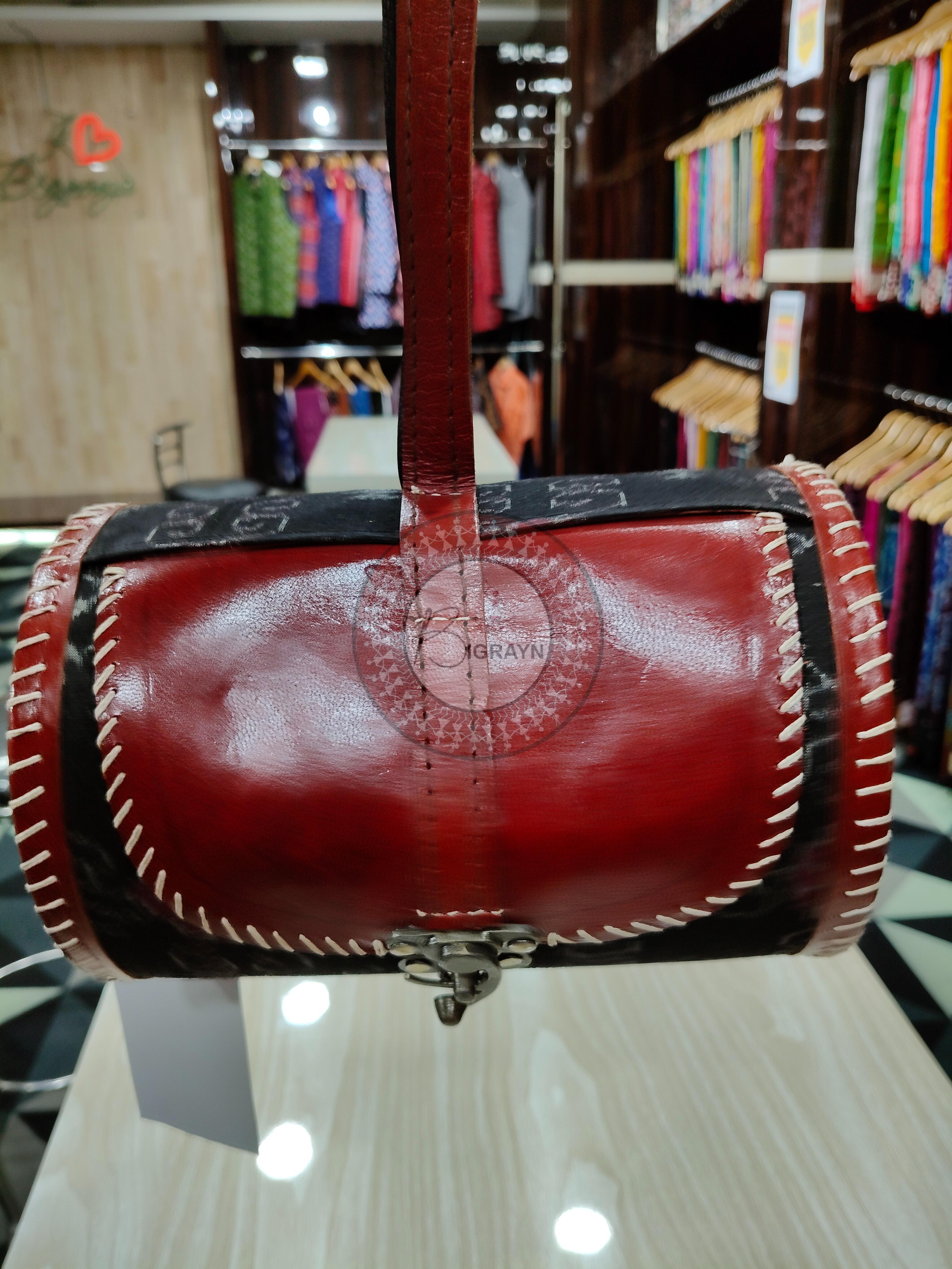 Black Tribal Dholki Round Leather Bags