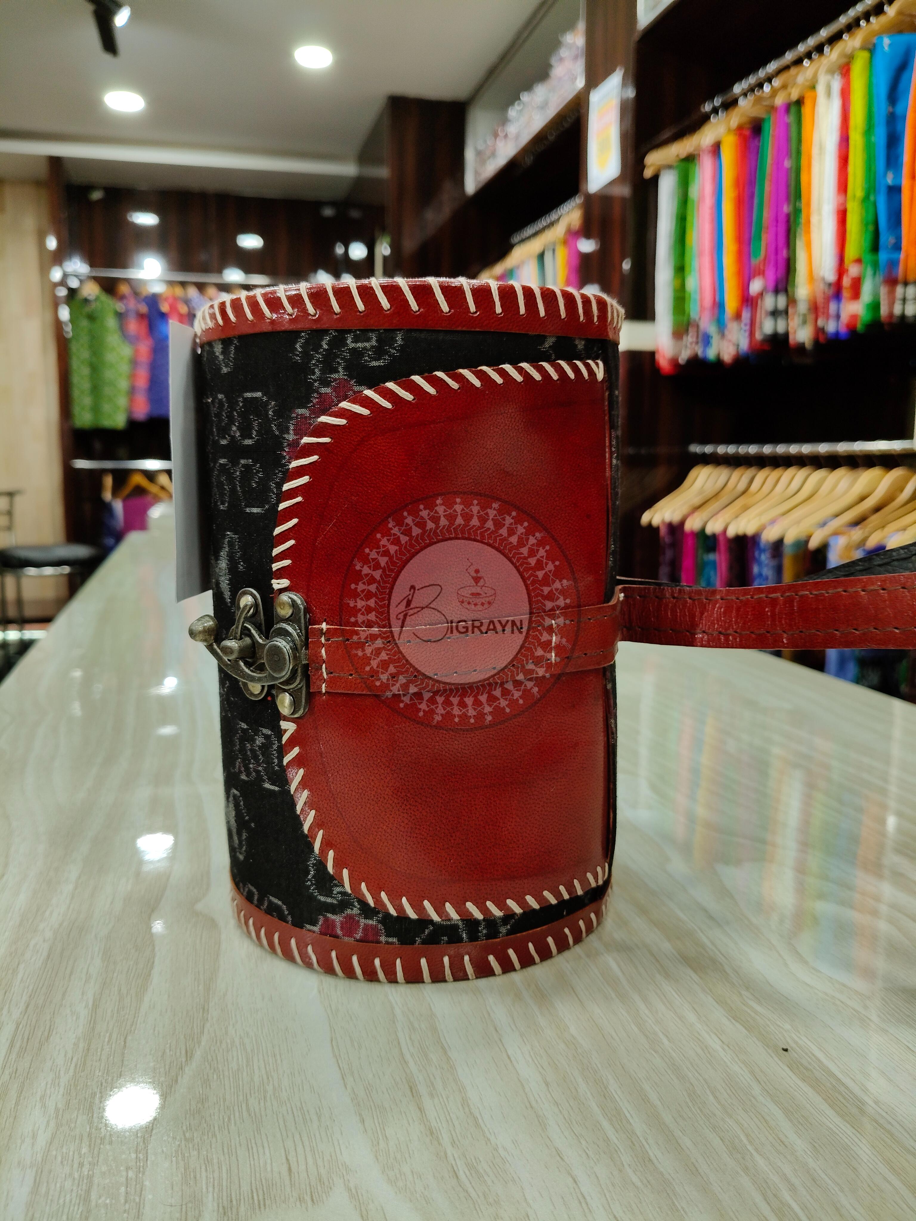 Black Tribal Dholki Round Leather Bags