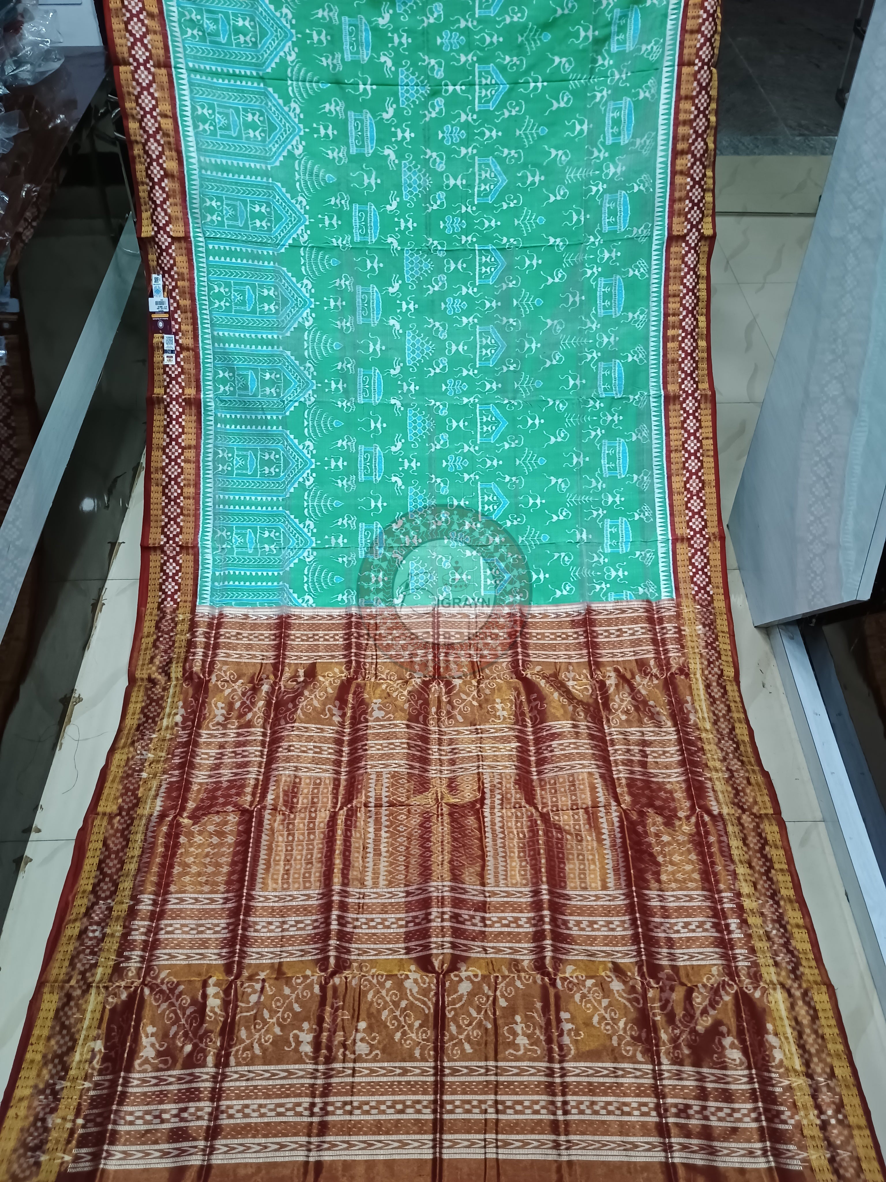 "Odisha Handloom Tissue Silk Saree with shimmering texture, elegant zari border, and lightweight drape, handcrafted by artisans"