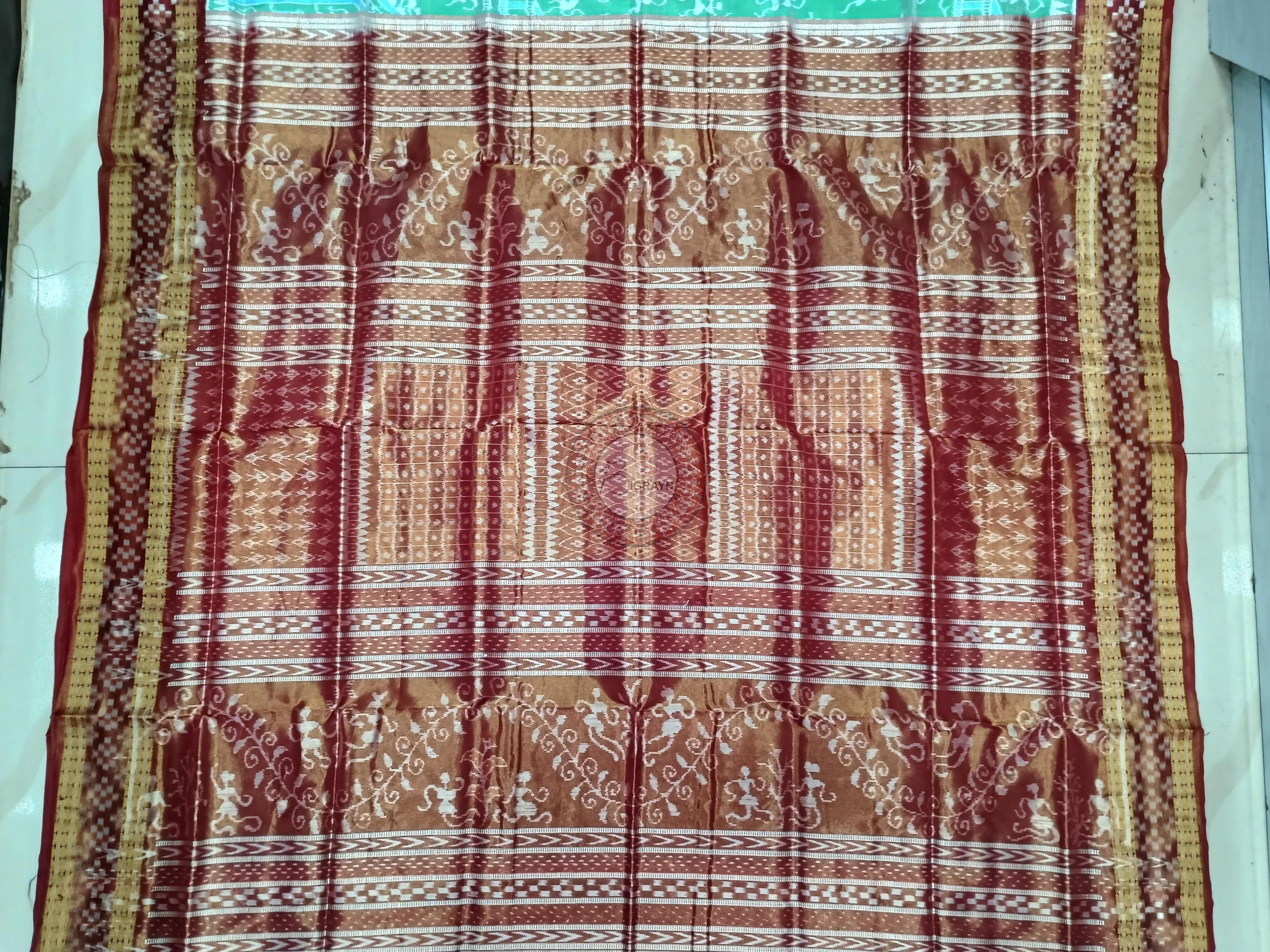 "Odisha Handloom Tissue Silk Saree with shimmering texture, elegant zari border, and lightweight drape, handcrafted by artisans"