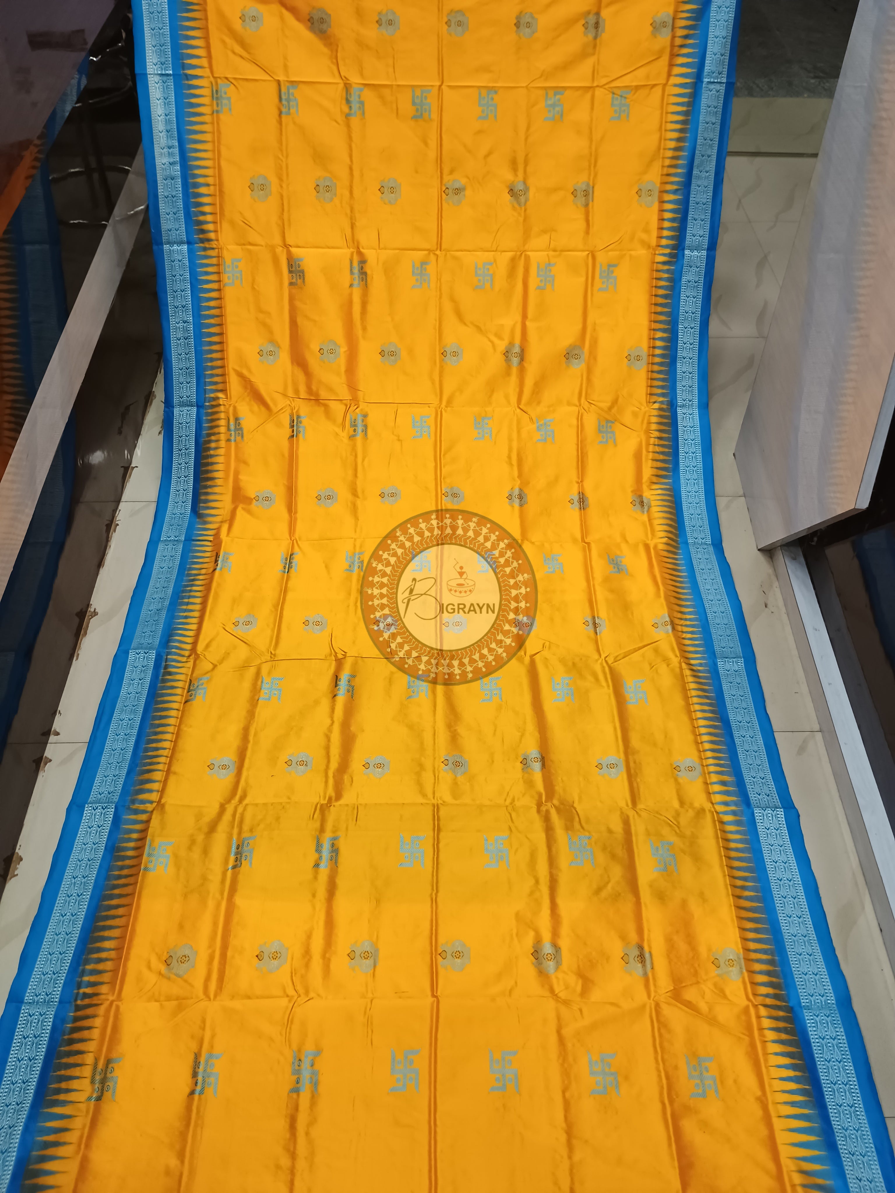 Yellow Copper Sulphate Swastik Kalash Silk Saree