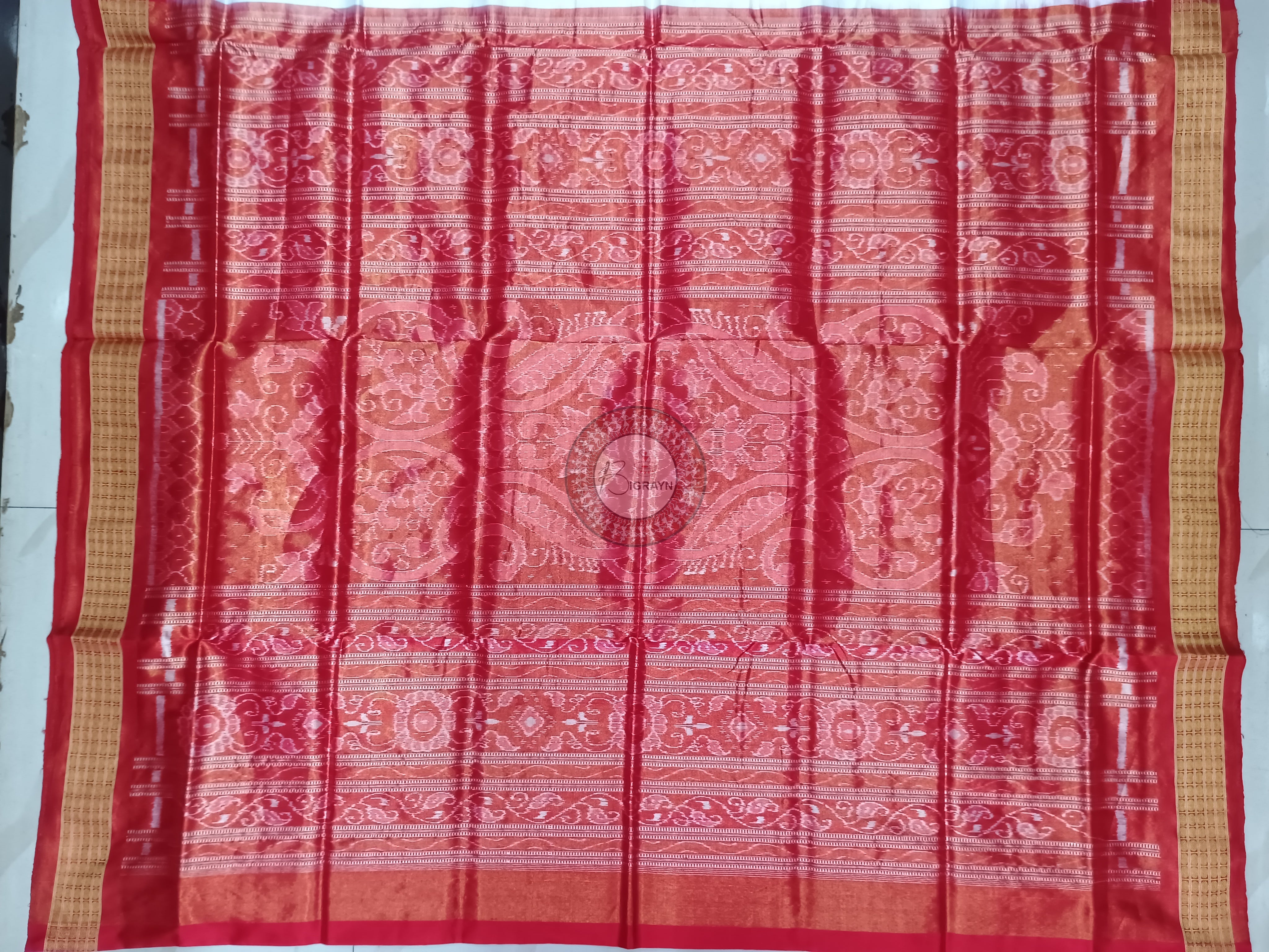 "Odisha Handloom Tissue Silk Saree with shimmering texture, elegant zari border, and lightweight drape, handcrafted by artisans"