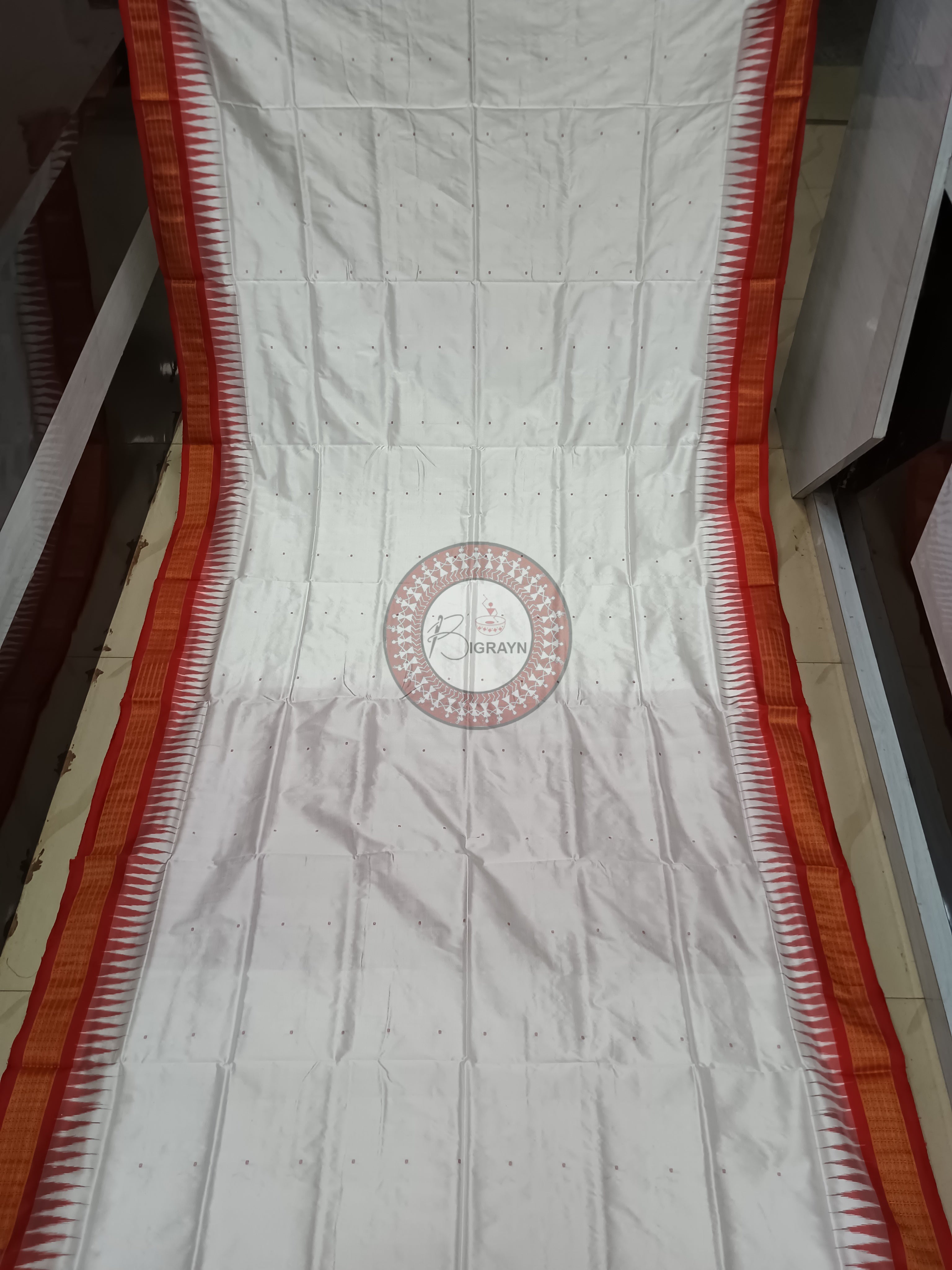 "Odisha Handloom Tissue Silk Saree with shimmering texture, elegant zari border, and lightweight drape, handcrafted by artisans"