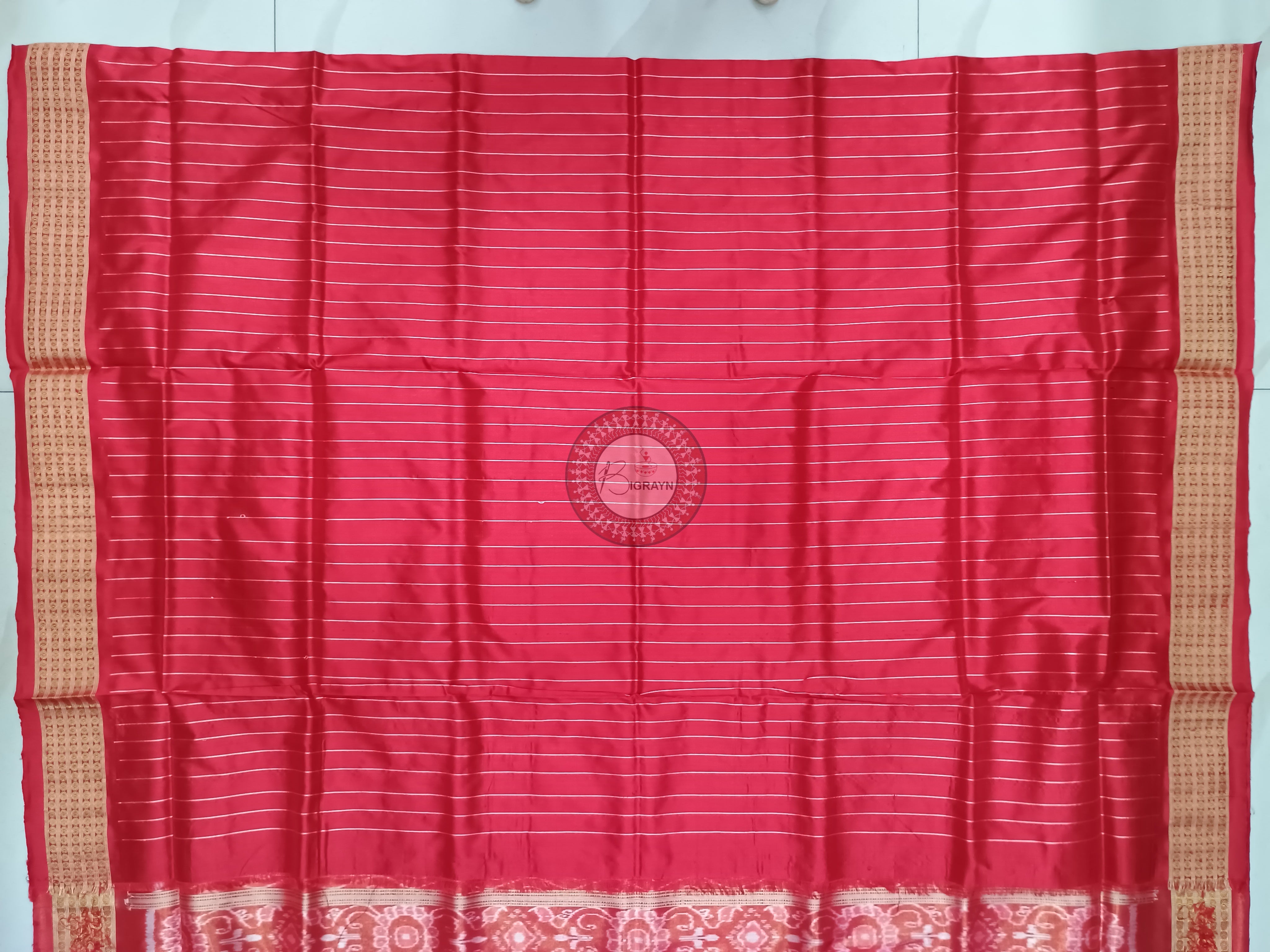 "Odisha Handloom Tissue Silk Saree with shimmering texture, elegant zari border, and lightweight drape, handcrafted by artisans"