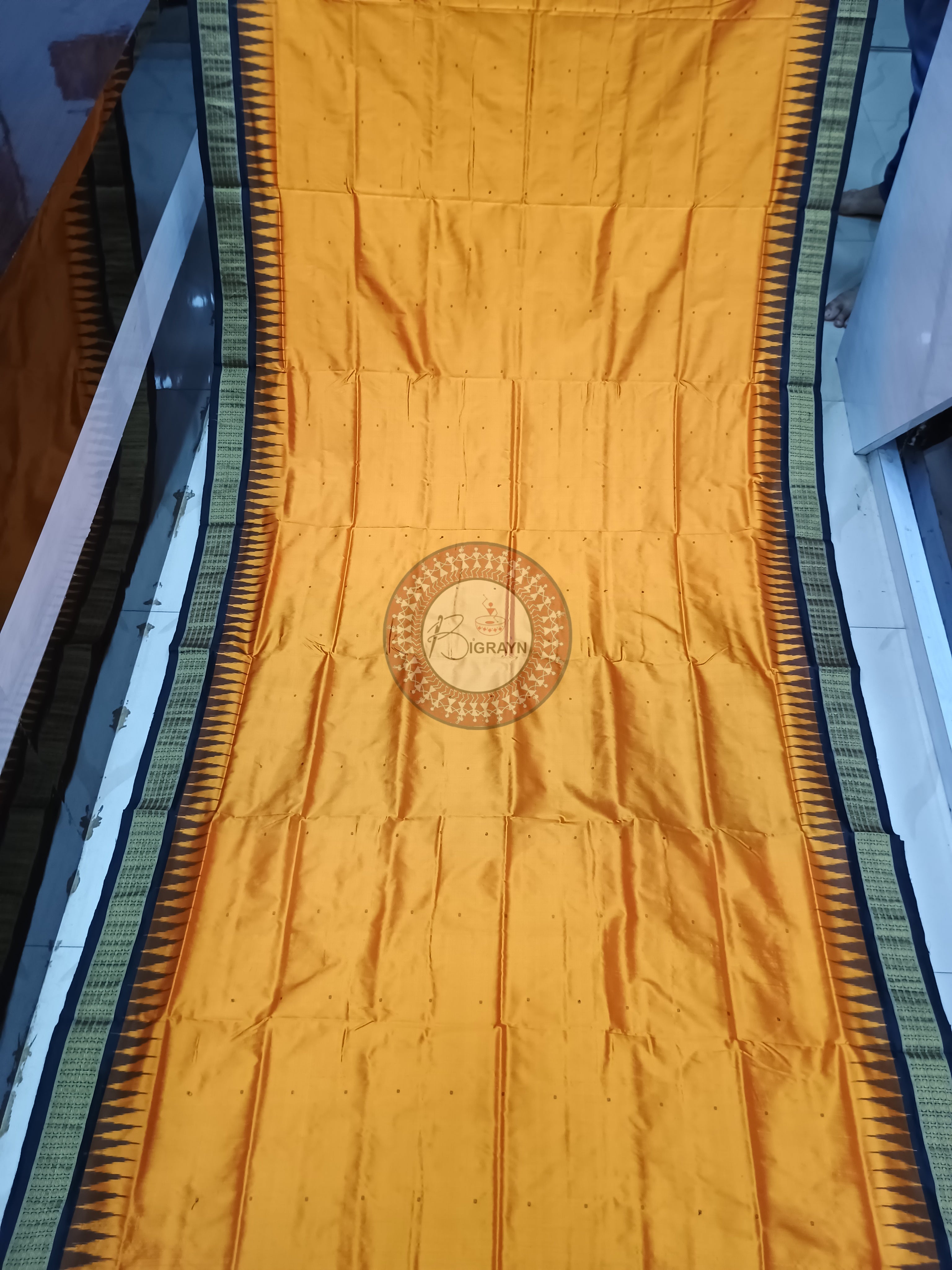 "Odisha Handloom Tissue Silk Saree with shimmering texture, elegant zari border, and lightweight drape, handcrafted by artisans"