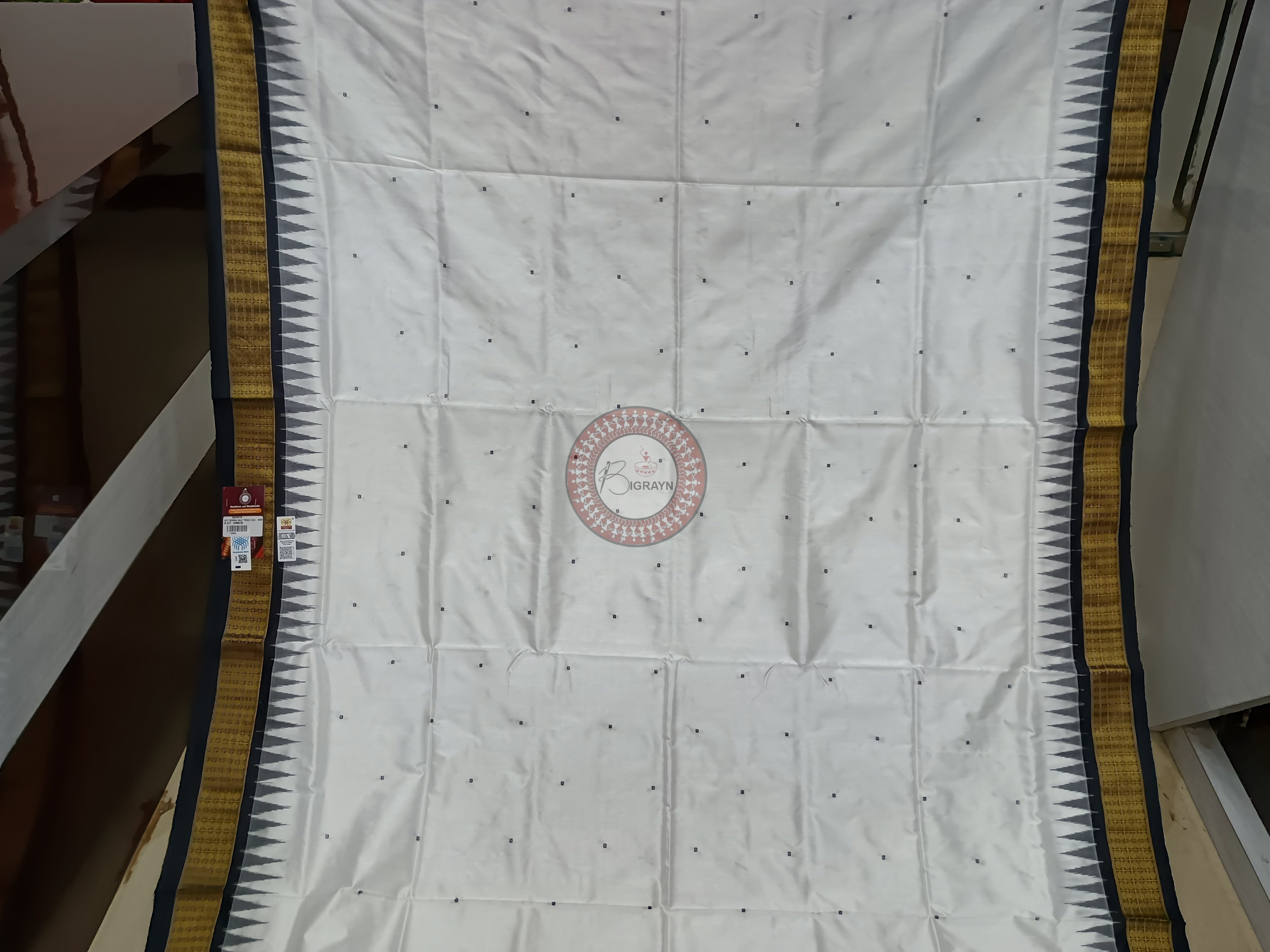 "Odisha Handloom Tissue Silk Saree with shimmering texture, elegant zari border, and lightweight drape, handcrafted by artisans"