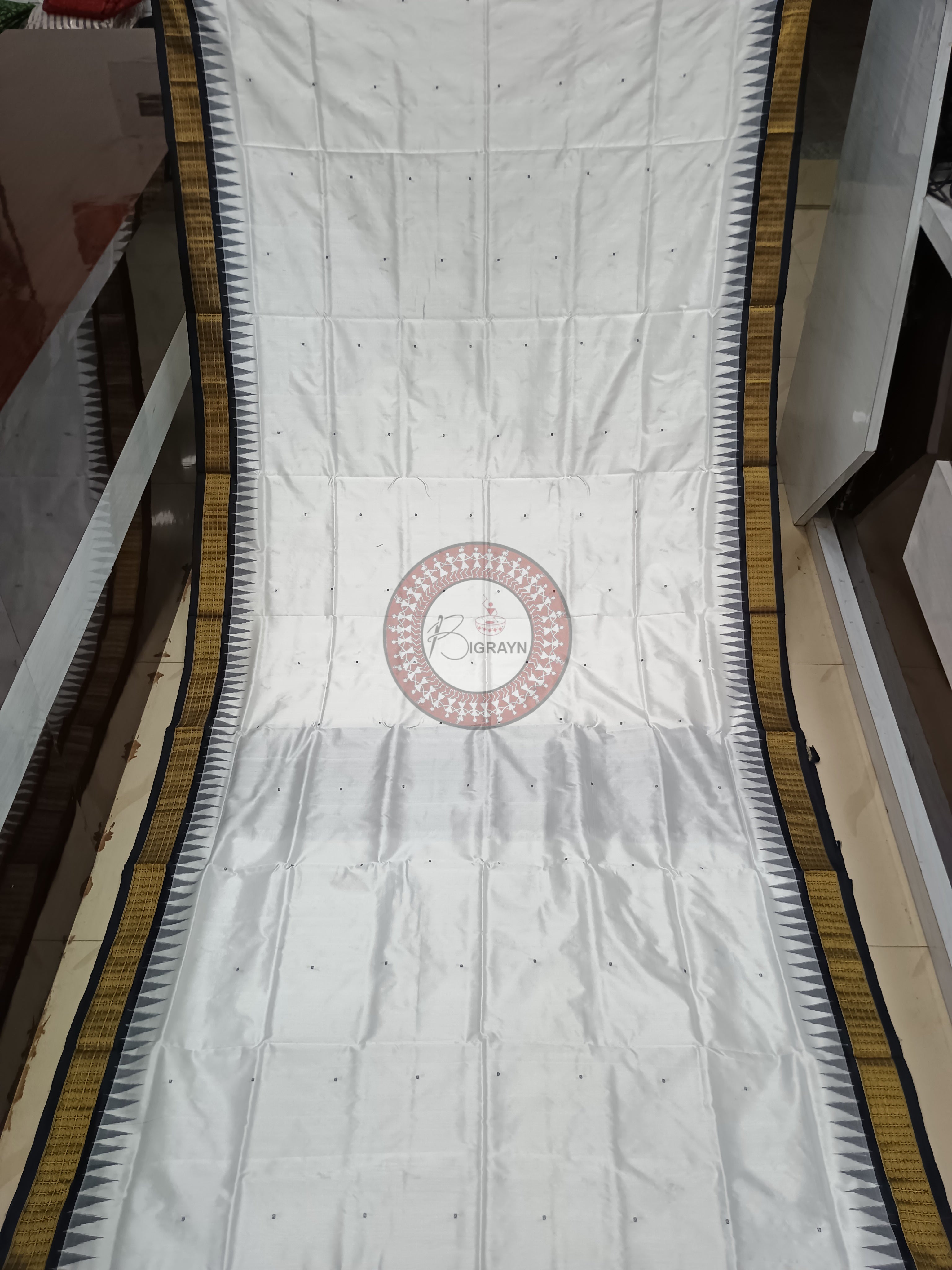 "Odisha Handloom Tissue Silk Saree with shimmering texture, elegant zari border, and lightweight drape, handcrafted by artisans"