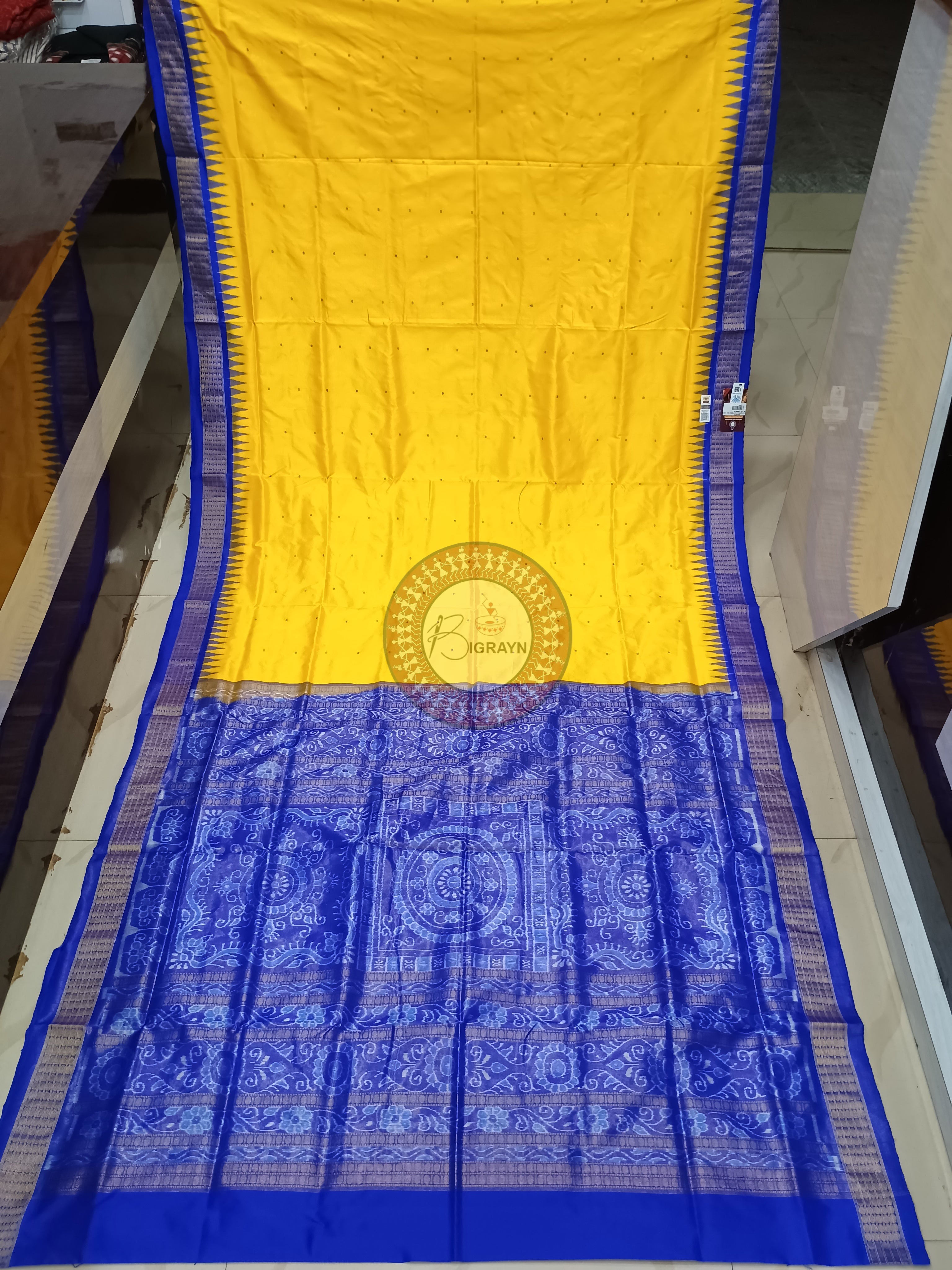 "Odisha Handloom Tissue Silk Saree with shimmering texture, elegant zari border, and lightweight drape, handcrafted by artisans"