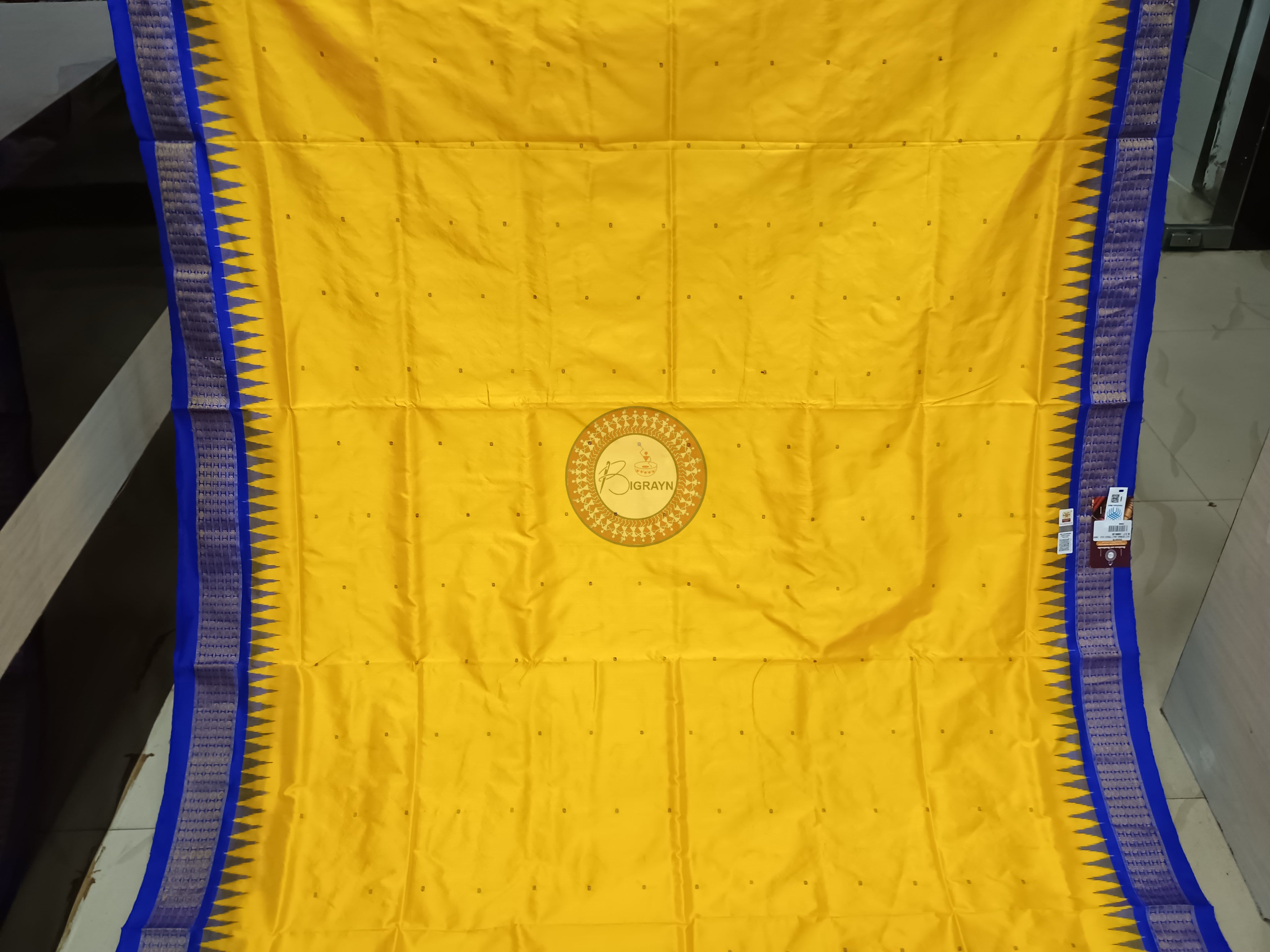 "Odisha Handloom Tissue Silk Saree with shimmering texture, elegant zari border, and lightweight drape, handcrafted by artisans"