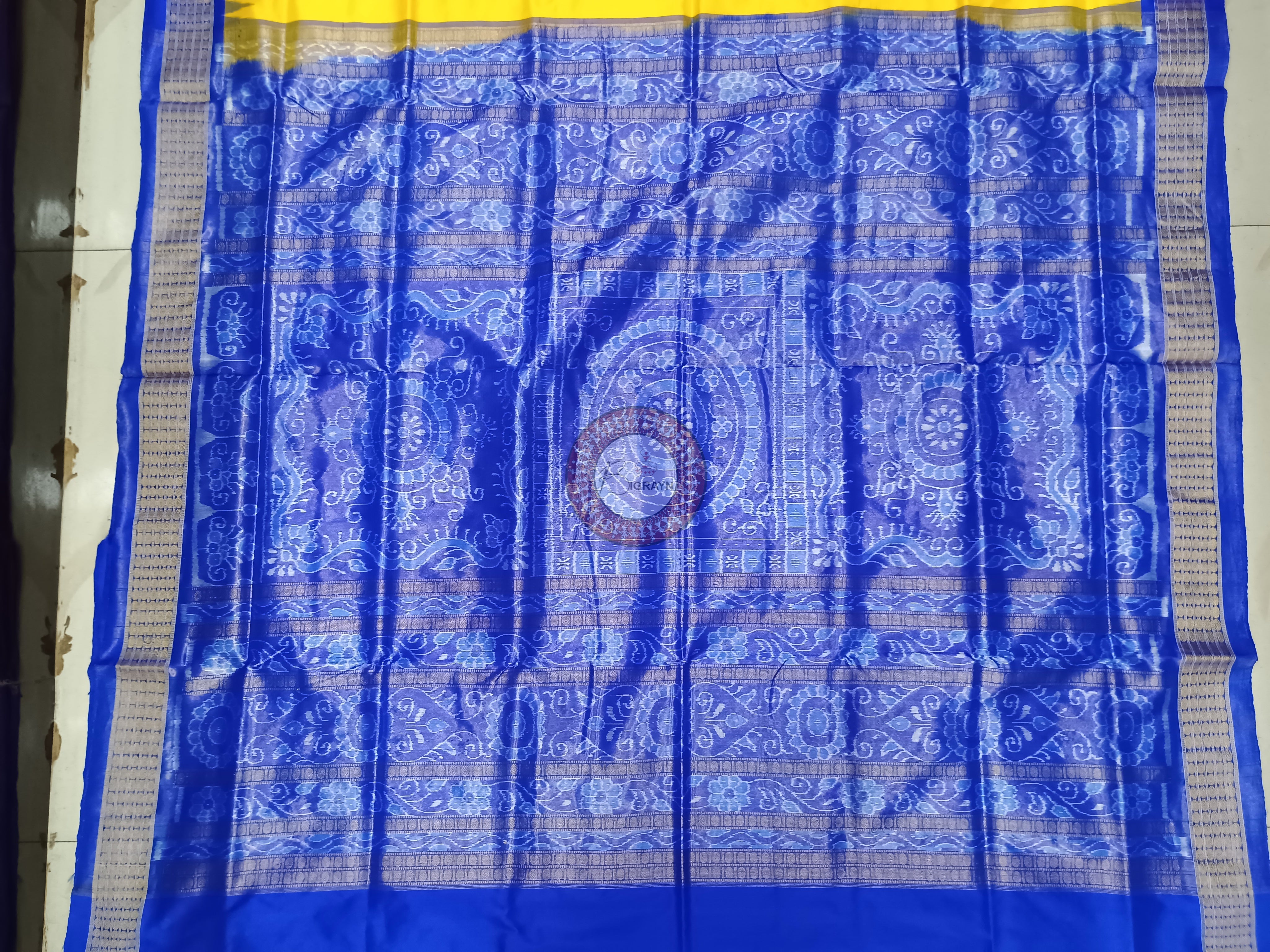 "Odisha Handloom Tissue Silk Saree with shimmering texture, elegant zari border, and lightweight drape, handcrafted by artisans"