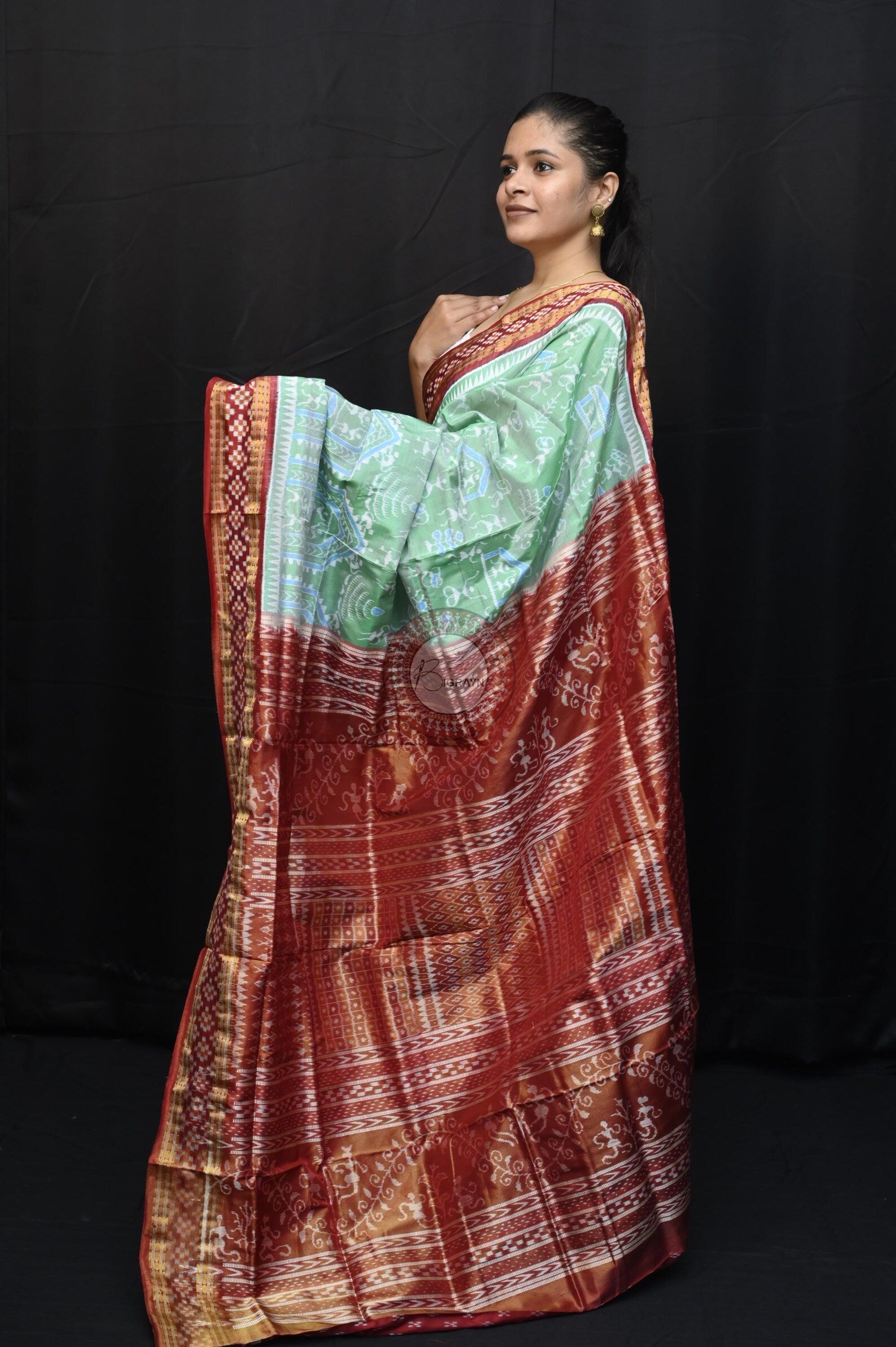 "Odisha Handloom Tissue Silk Saree with shimmering texture, elegant zari border, and lightweight drape, handcrafted by artisans"