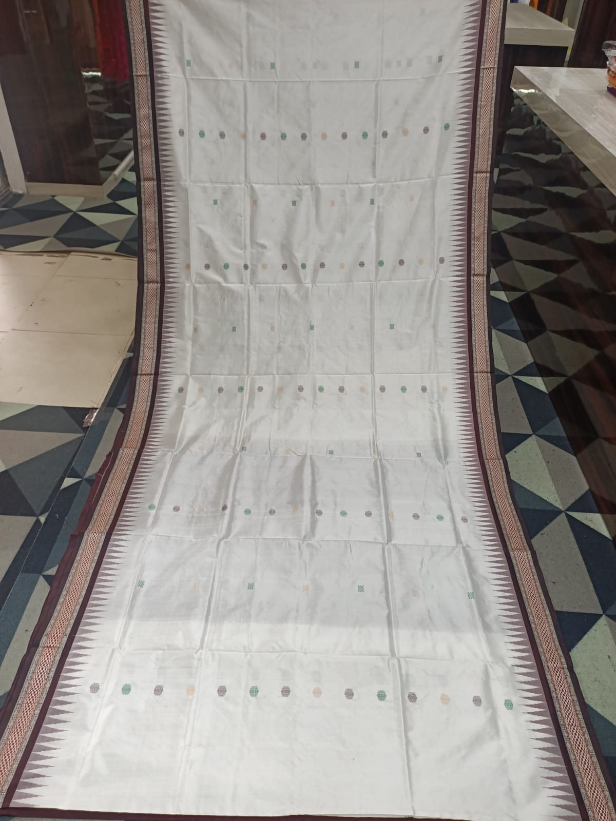 White Coffee Konark Temple Chakra Sambalpuri Exclusive Silk Saree