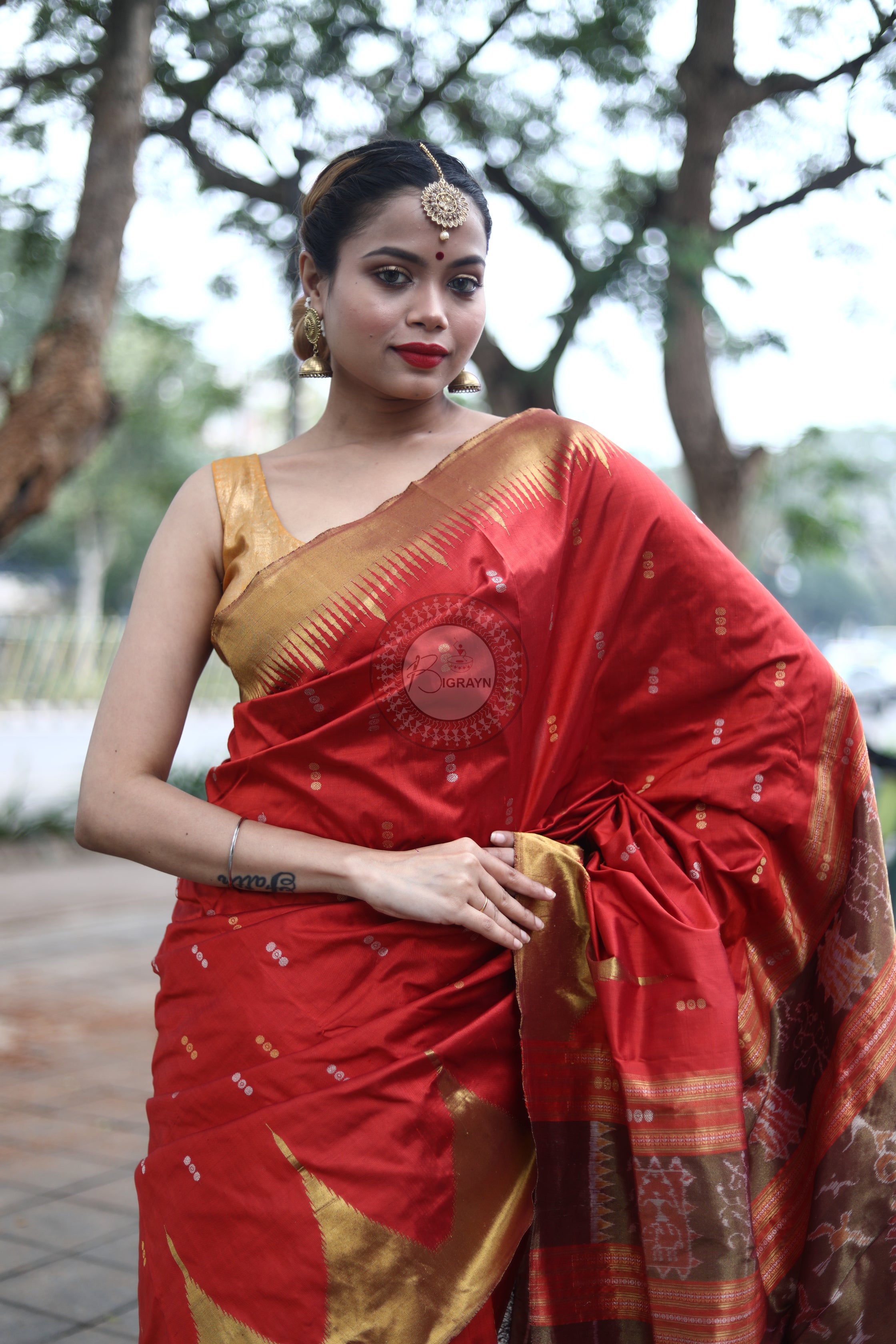 "Odisha Handloom Tissue Silk Saree with shimmering texture, elegant zari border, and lightweight drape, handcrafted by artisans"