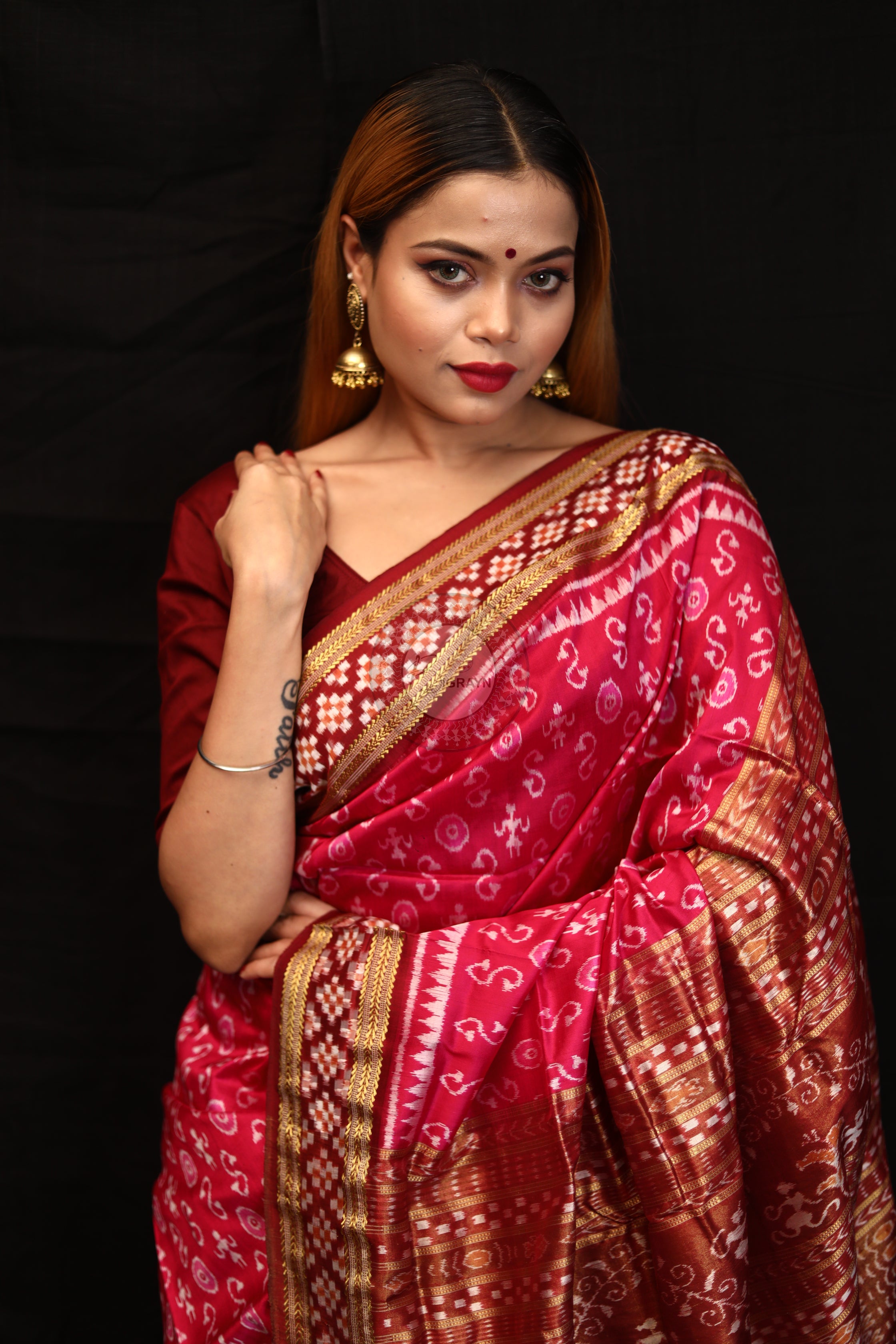 "Odisha Handloom Tissue Silk Saree with shimmering texture, elegant zari border, and lightweight drape, handcrafted by artisans"