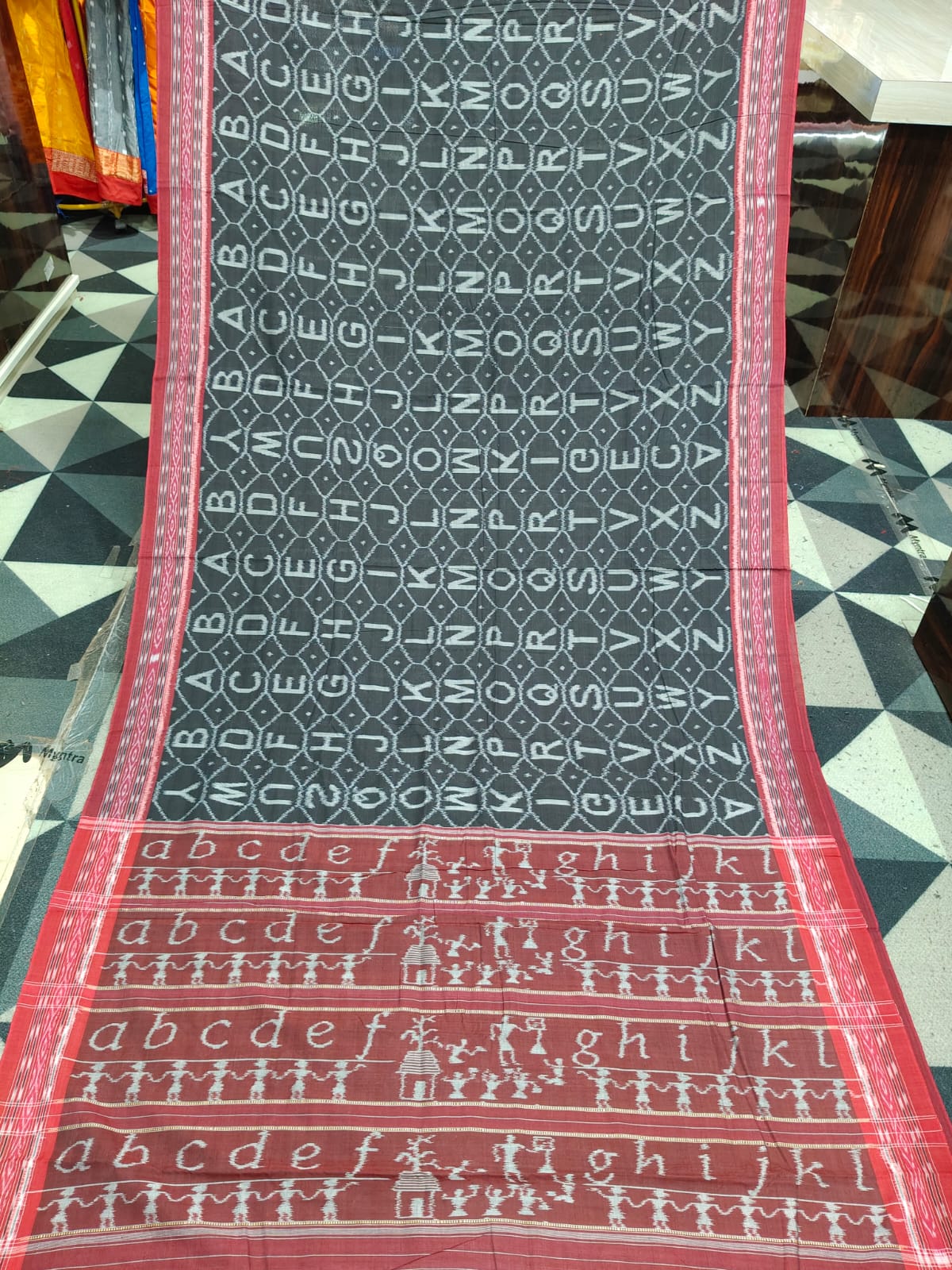 Black Maroon English Alphabet Design Khandua Cotton Saree
