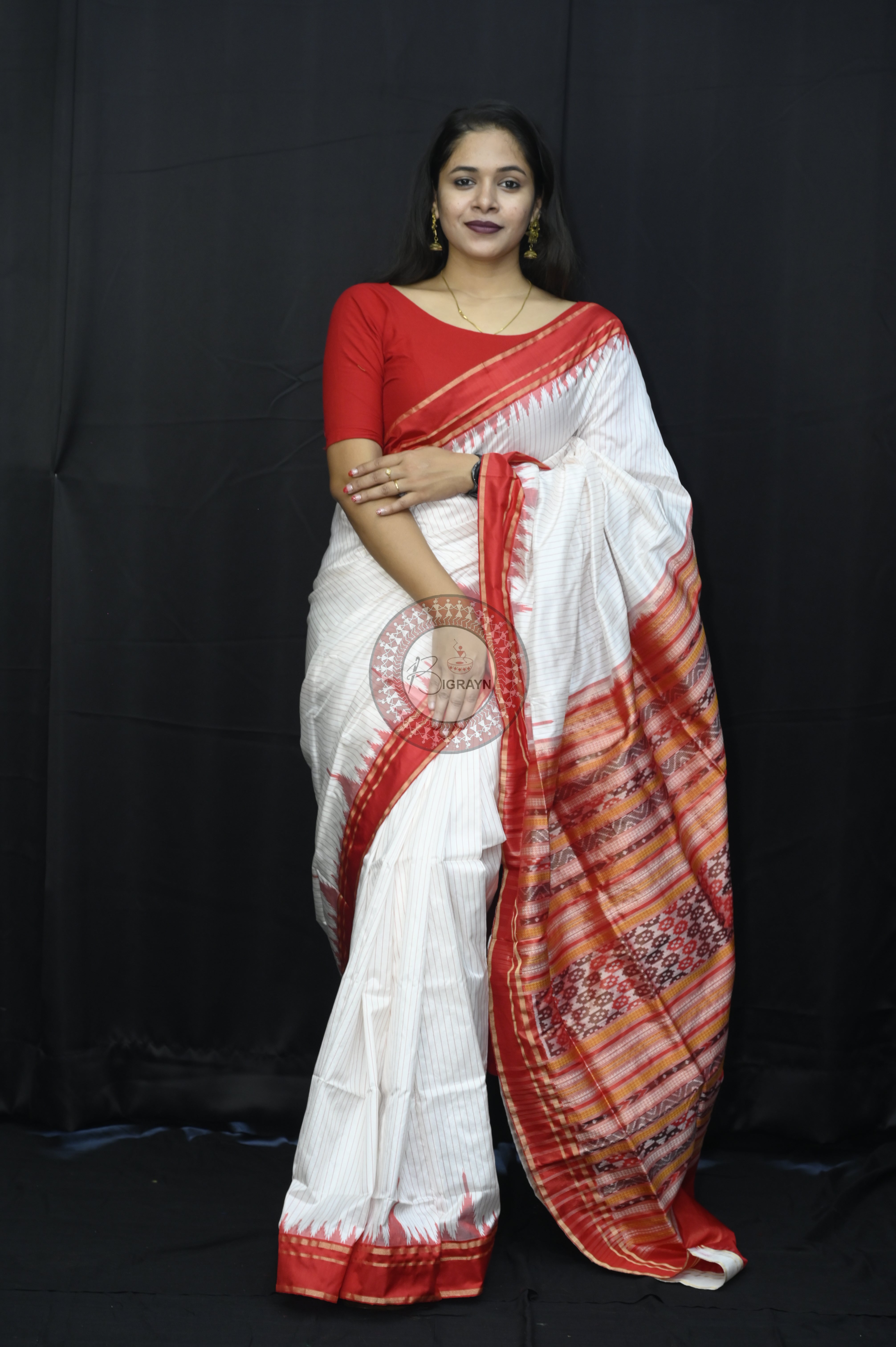 "Odisha Handloom Tissue Silk Saree with shimmering texture, elegant zari border, and lightweight drape, handcrafted by artisans"