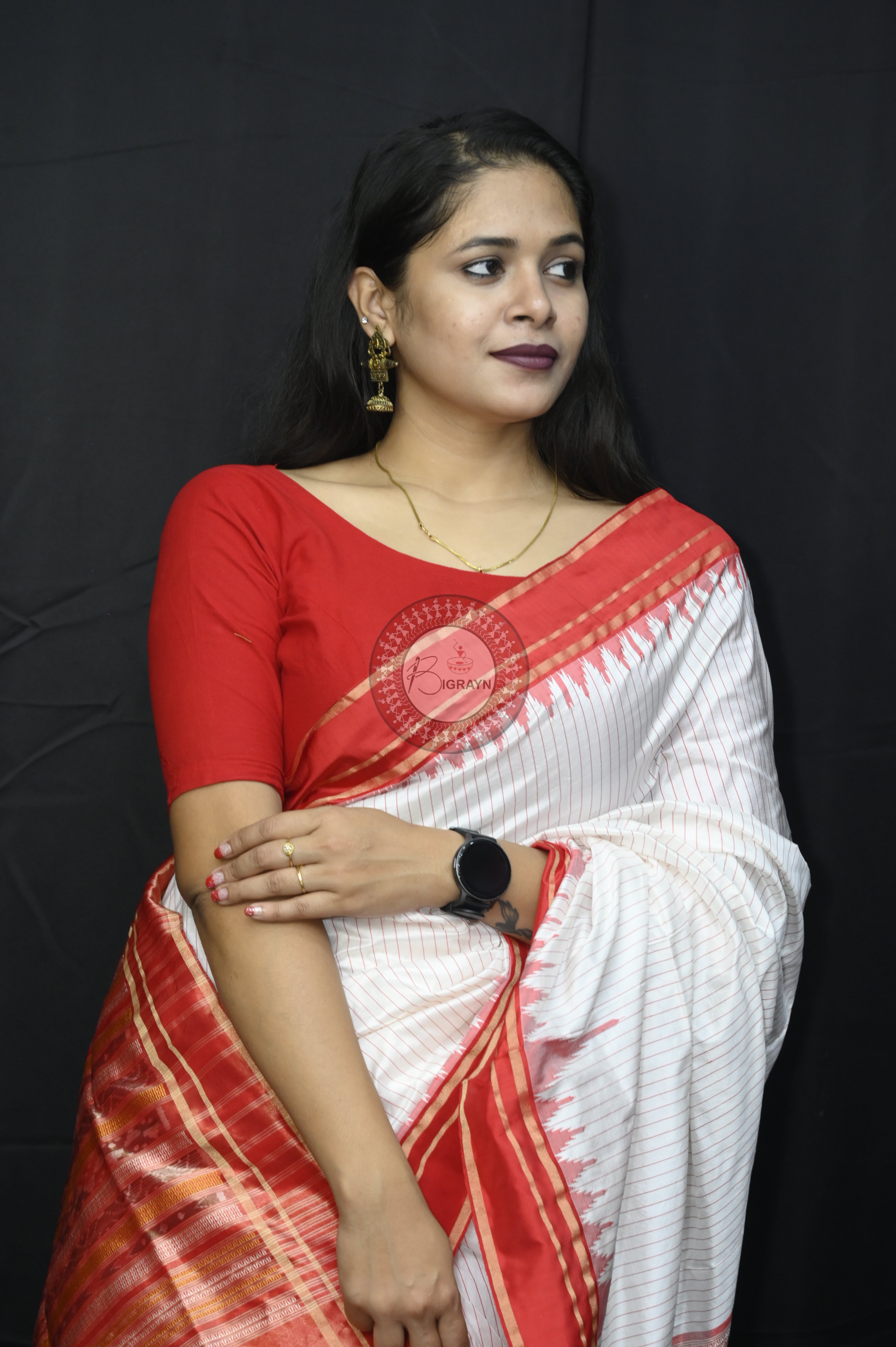 "Odisha Handloom Tissue Silk Saree with shimmering texture, elegant zari border, and lightweight drape, handcrafted by artisans"