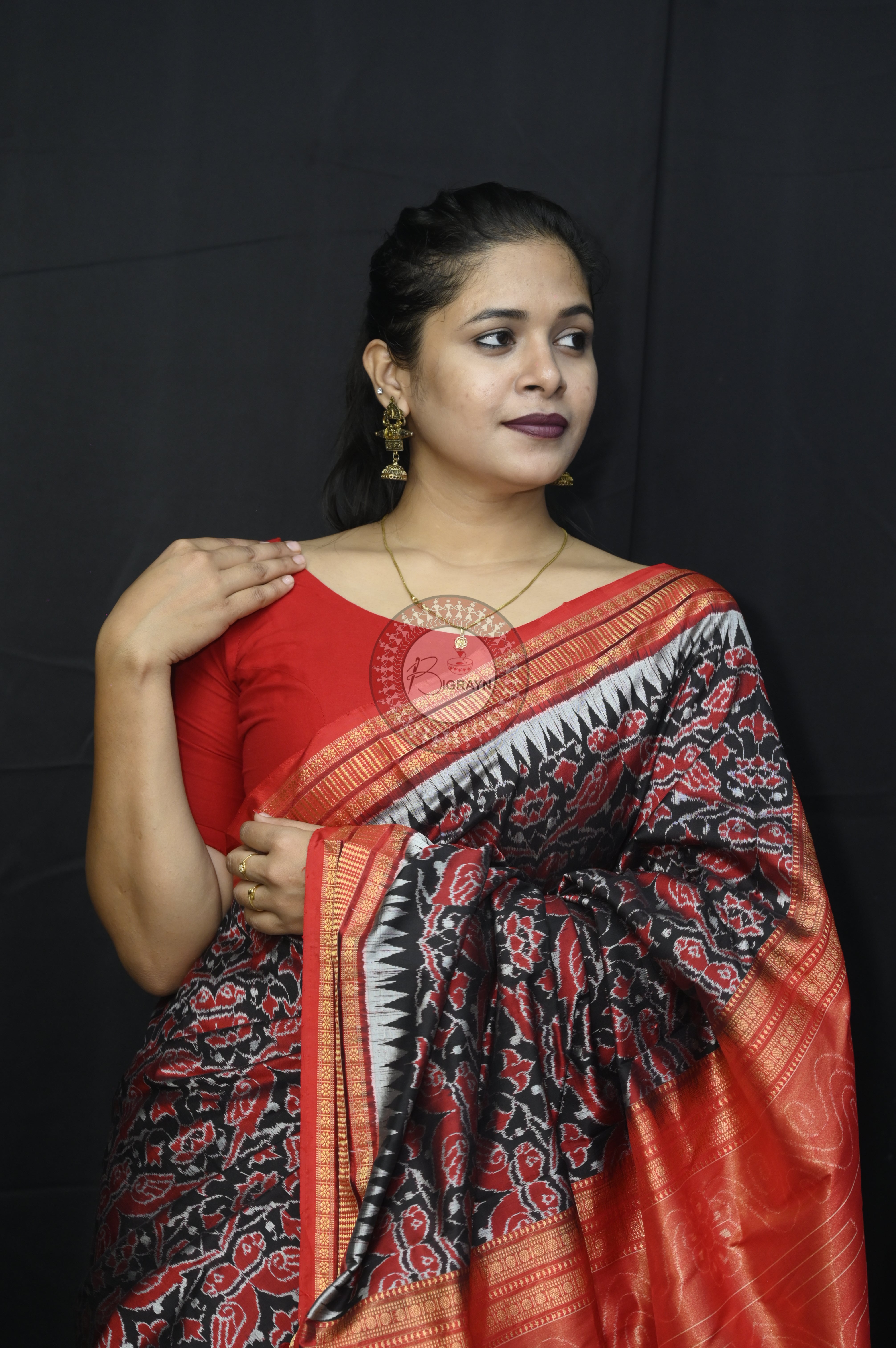 "Odisha Handloom Tissue Silk Saree with shimmering texture, elegant zari border, and lightweight drape, handcrafted by artisans"