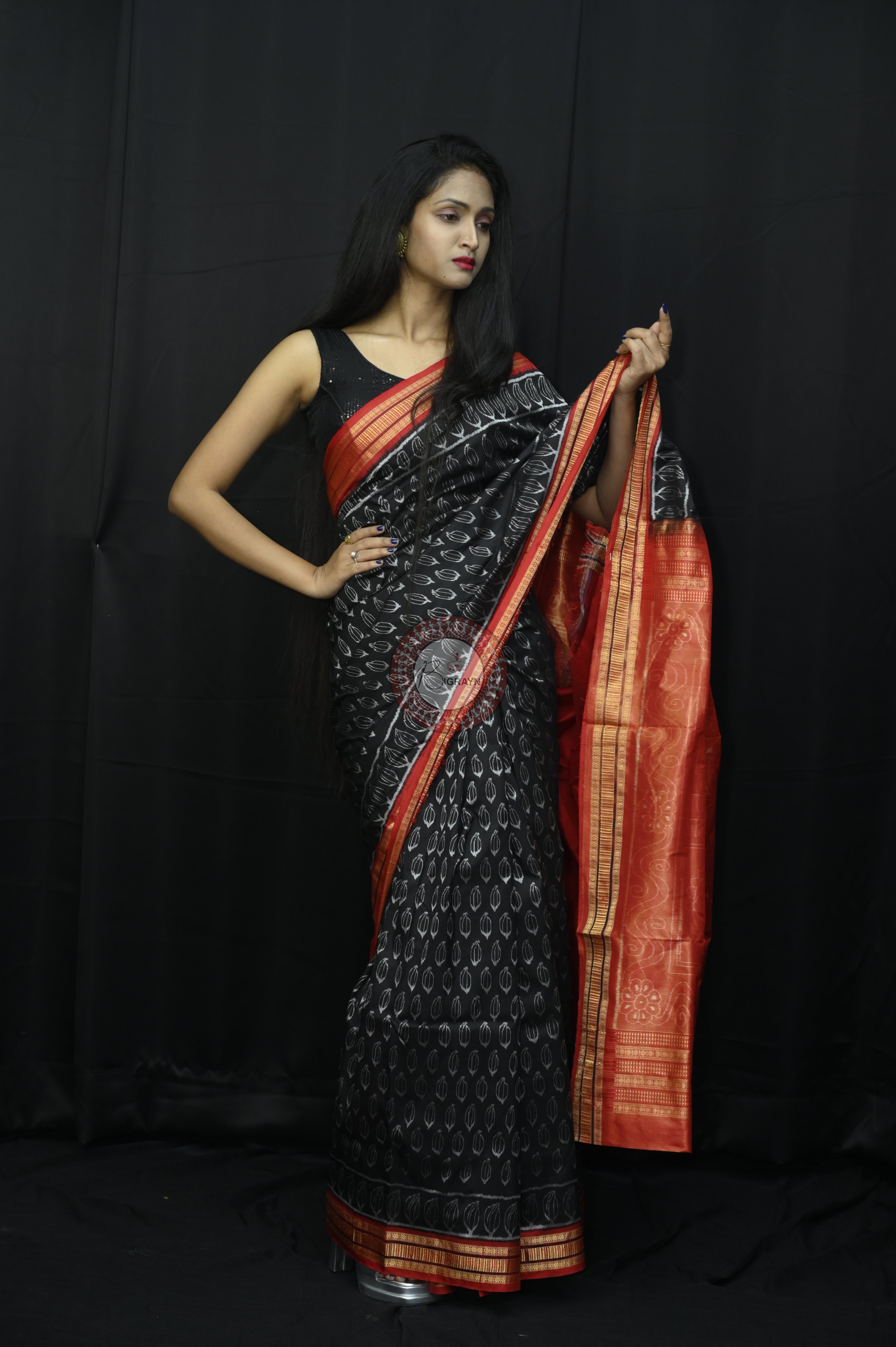 "Odisha Handloom Tissue Silk Saree with shimmering texture, elegant zari border, and lightweight drape, handcrafted by artisans"