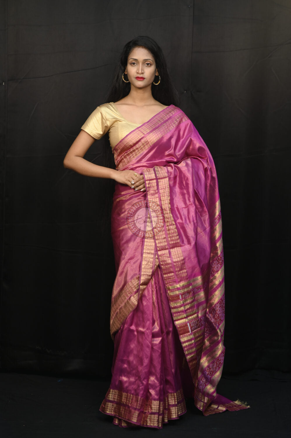 "Odisha Handloom Tissue Silk Saree with shimmering texture, elegant zari border, and lightweight drape, handcrafted by artisans"