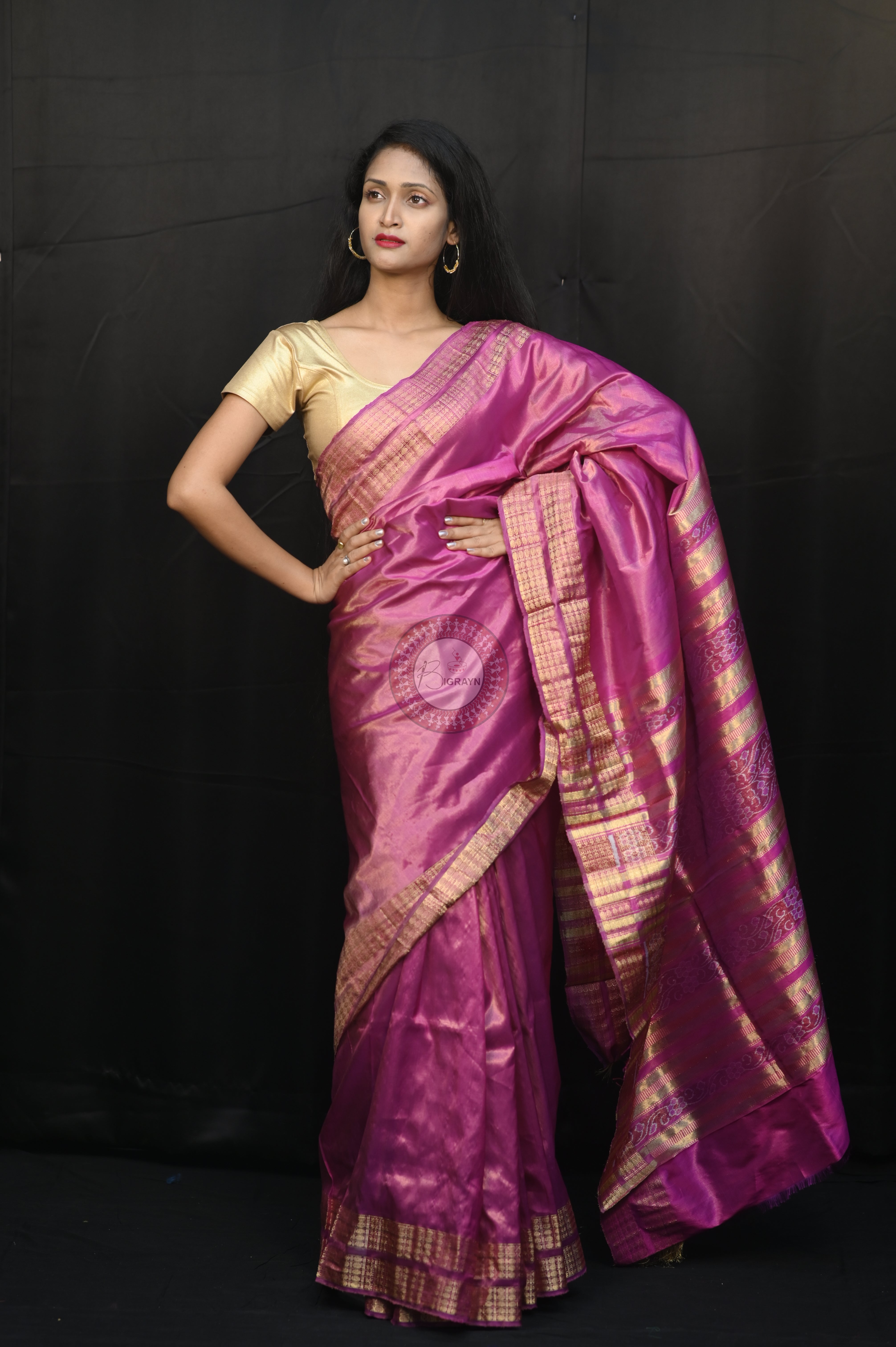 "Odisha Handloom Tissue Silk Saree with shimmering texture, elegant zari border, and lightweight drape, handcrafted by artisans"