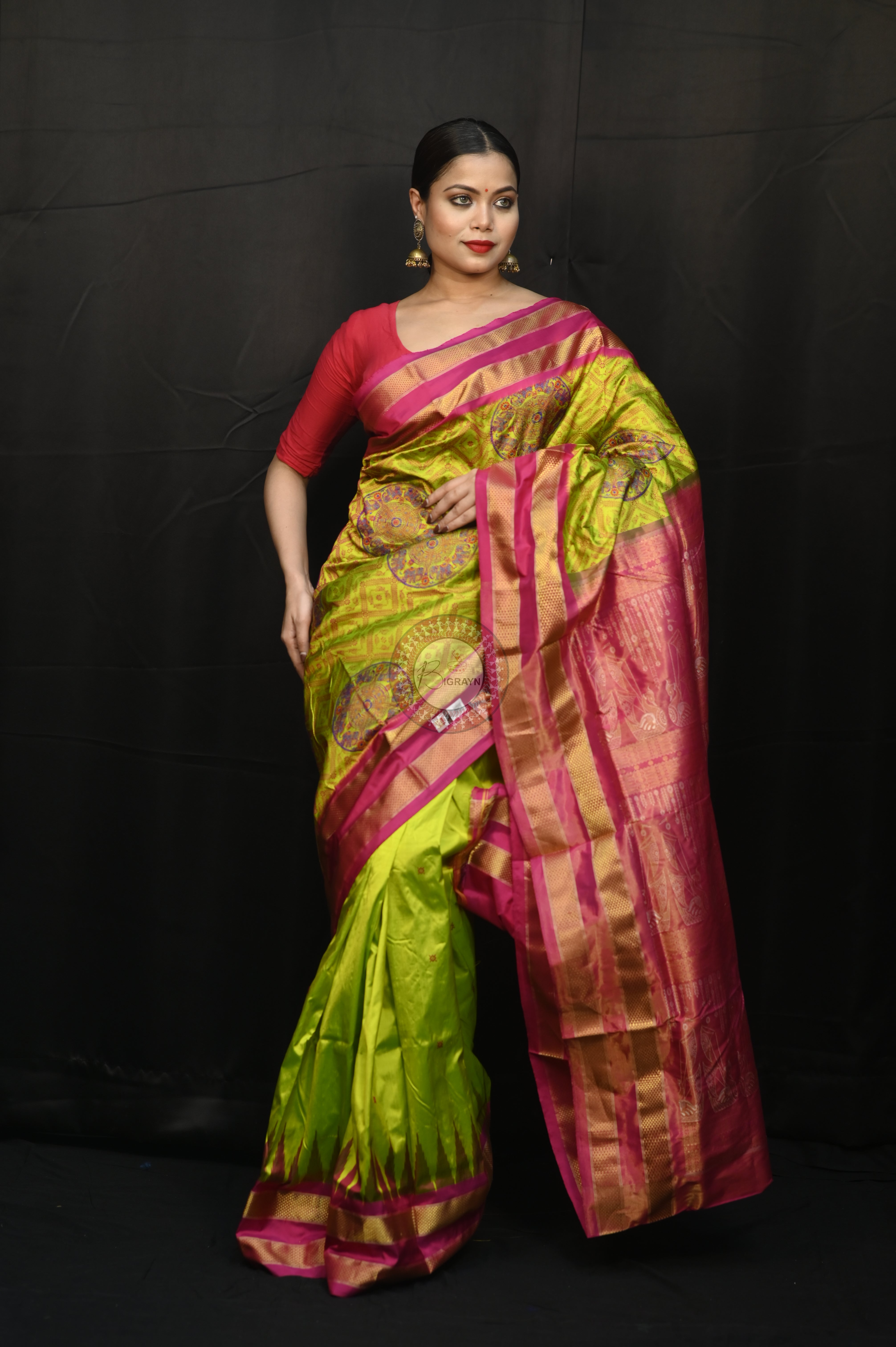 "Odisha Handloom Tissue Silk Saree with shimmering texture, elegant zari border, and lightweight drape, handcrafted by artisans"
