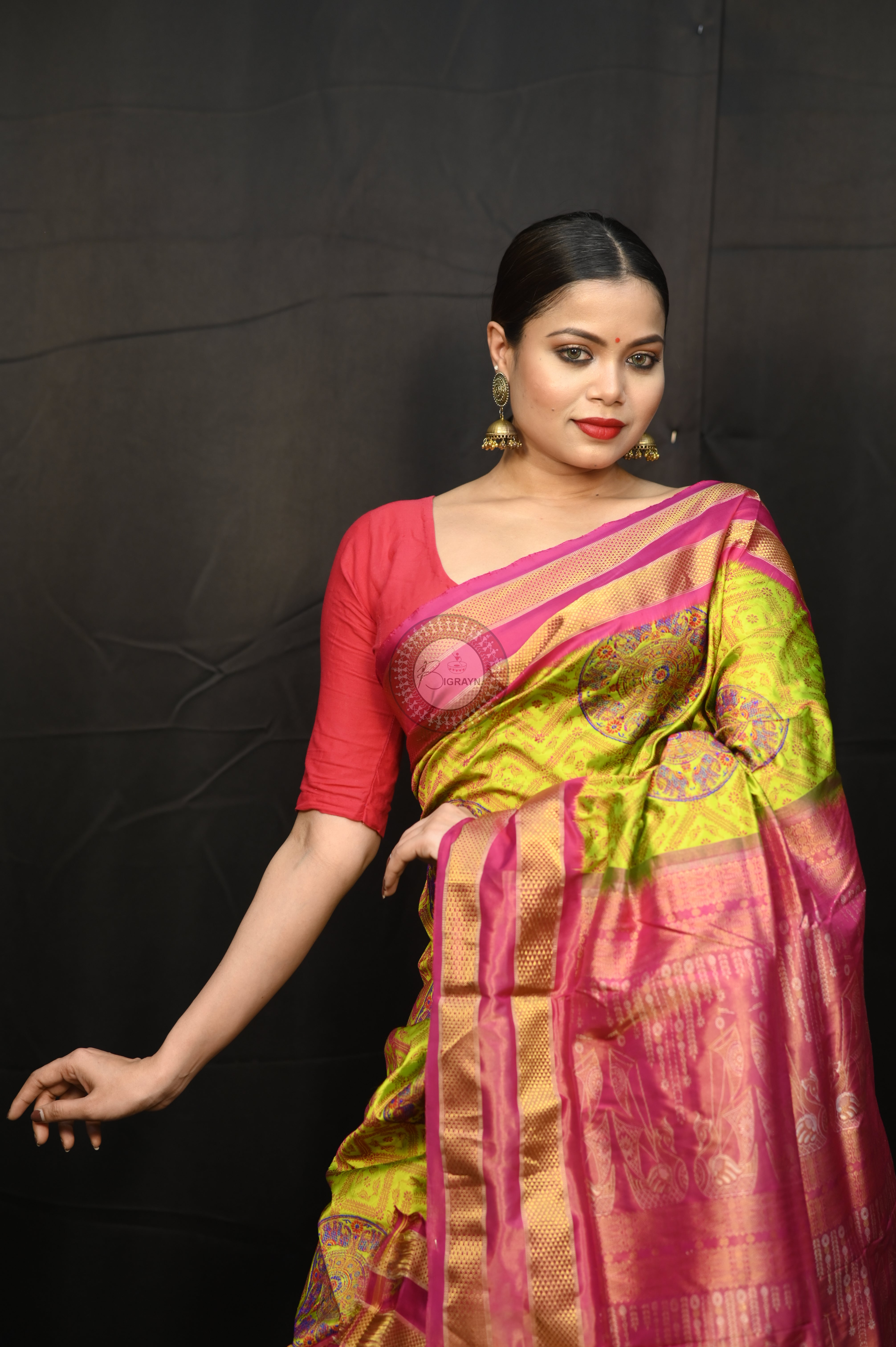 "Odisha Handloom Tissue Silk Saree with shimmering texture, elegant zari border, and lightweight drape, handcrafted by artisans"