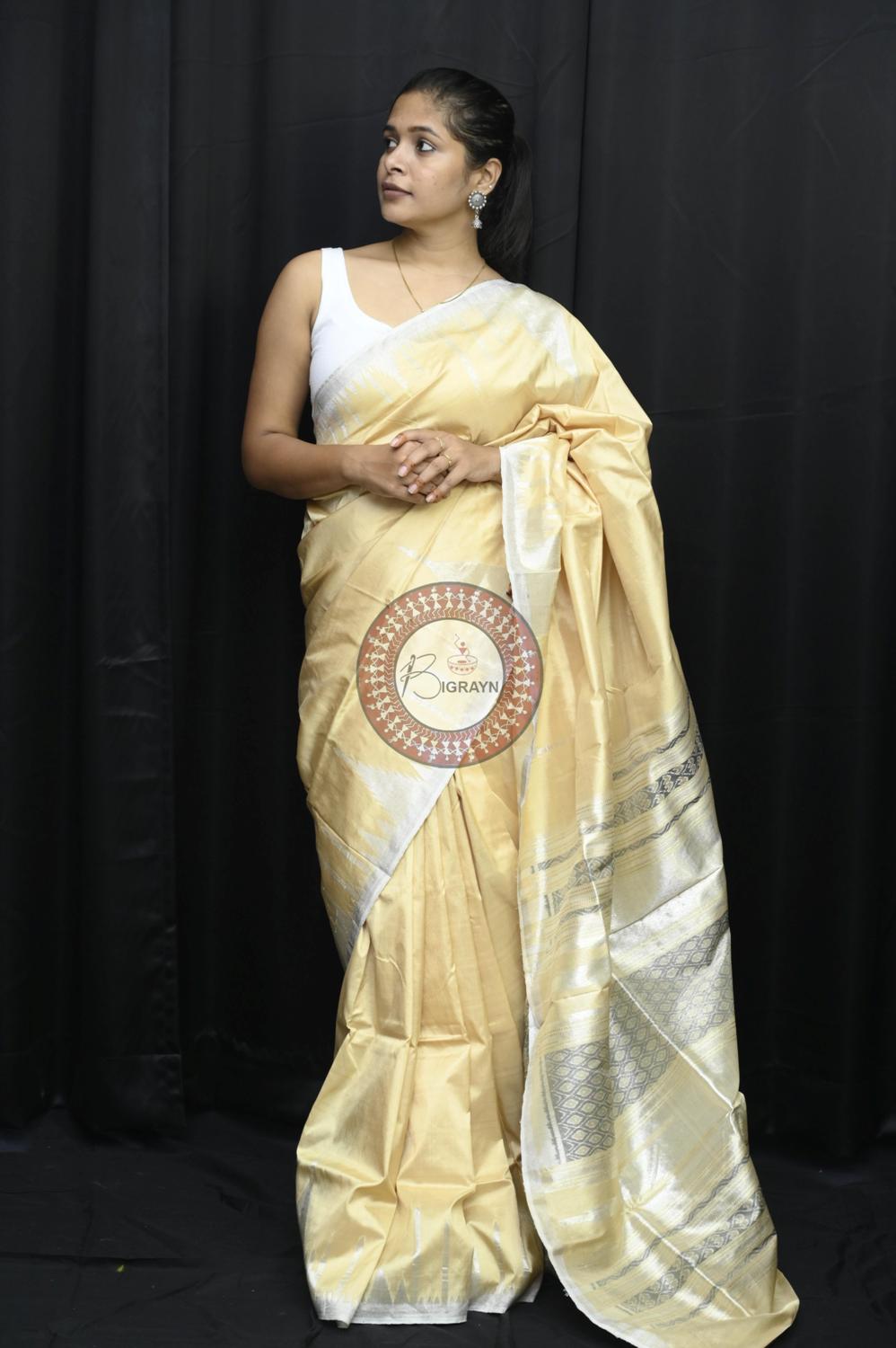 "Odisha Handloom Tissue Silk Saree with shimmering texture, elegant zari border, and lightweight drape, handcrafted by artisans"