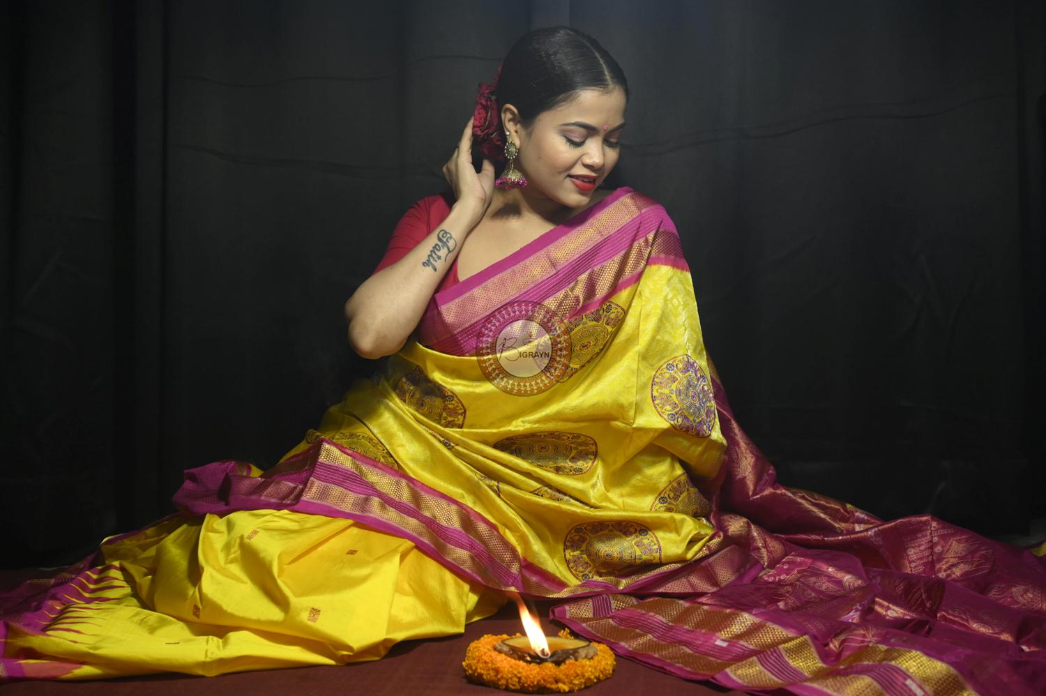 "Odisha Handloom Tissue Silk Saree with shimmering texture, elegant zari border, and lightweight drape, handcrafted by artisans"