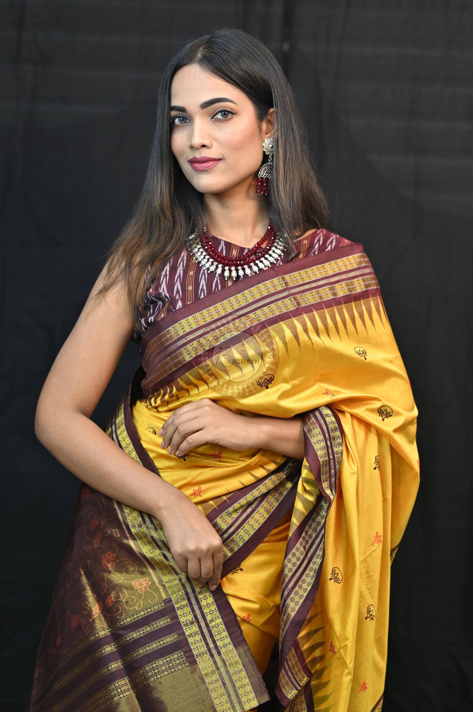 "Odisha Handloom Tissue Silk Saree with shimmering texture, elegant zari border, and lightweight drape, handcrafted by artisans"