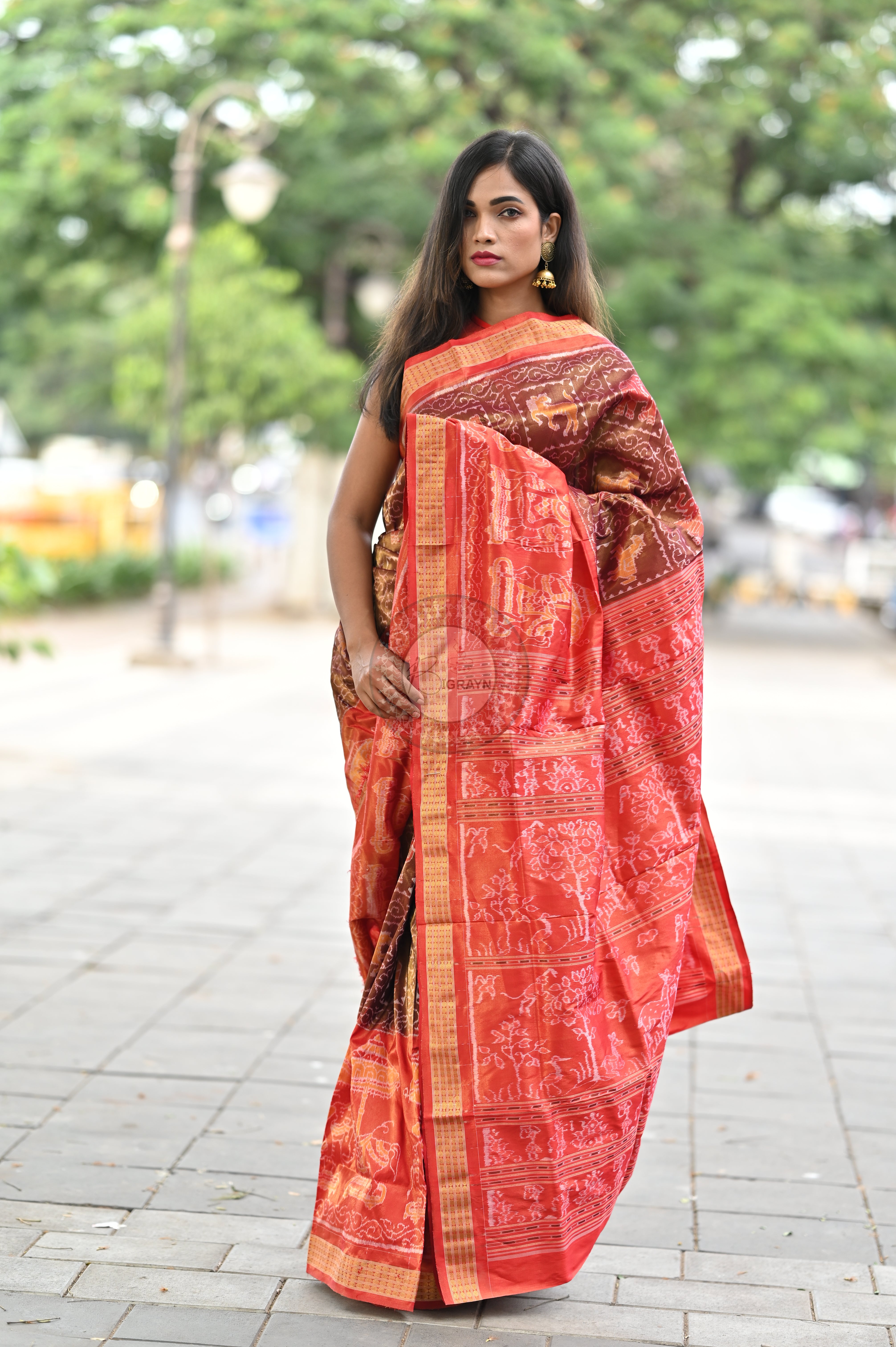 "Odisha Handloom Tissue Silk Saree with shimmering texture, elegant zari border, and lightweight drape, handcrafted by artisans"