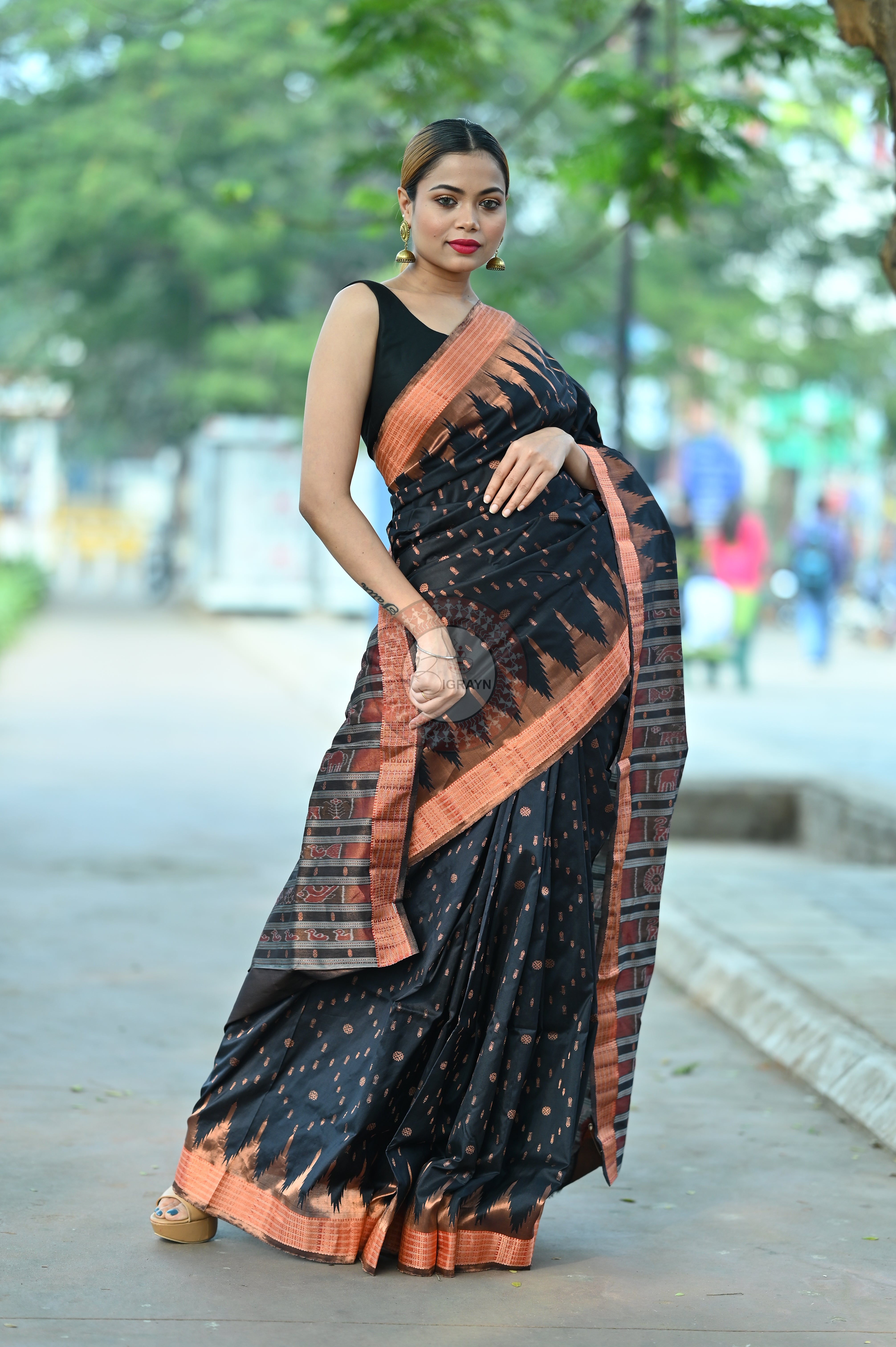 "Odisha Handloom Tissue Silk Saree with shimmering texture, elegant zari border, and lightweight drape, handcrafted by artisans"