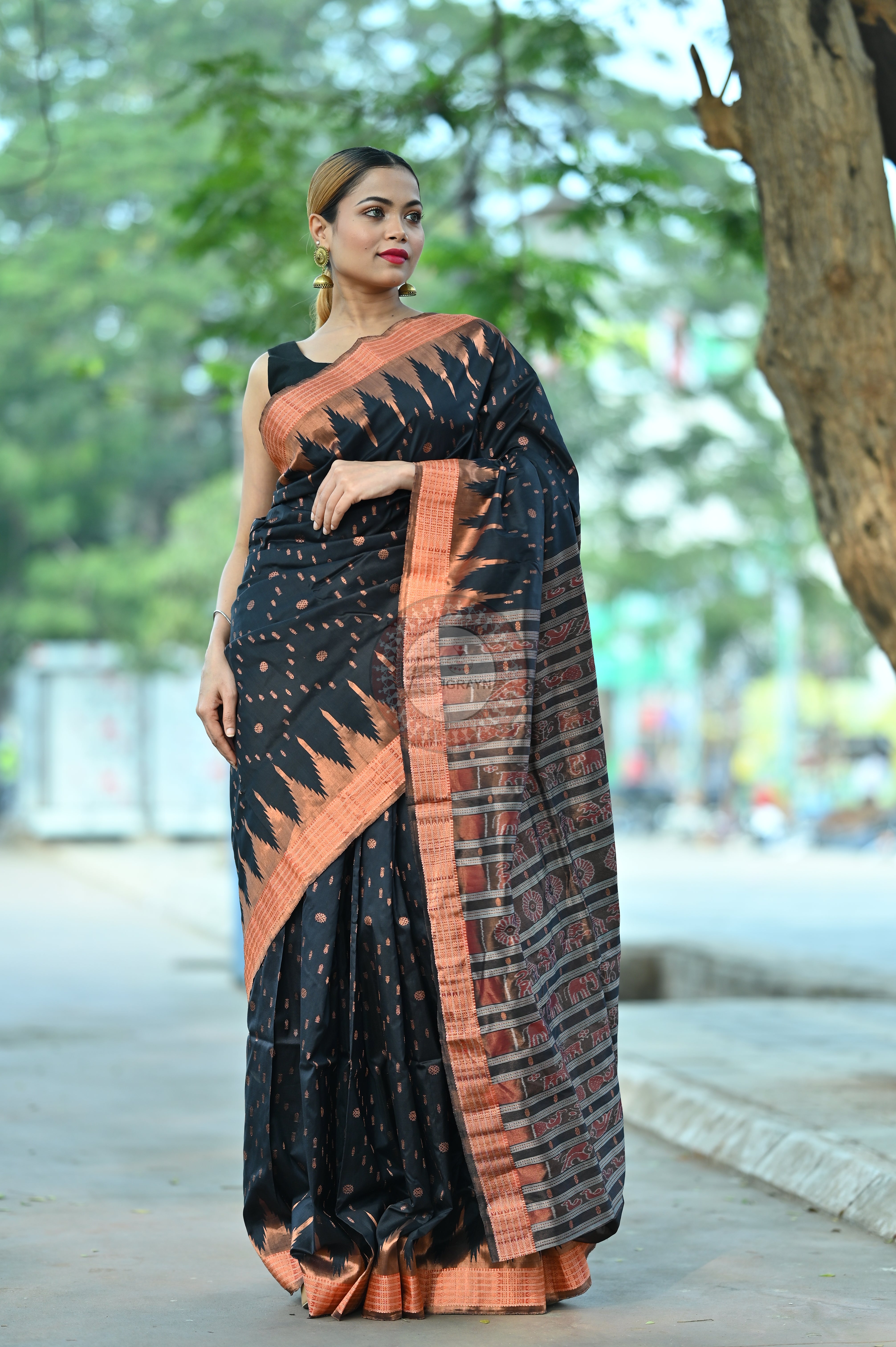 "Odisha Handloom Tissue Silk Saree with shimmering texture, elegant zari border, and lightweight drape, handcrafted by artisans"