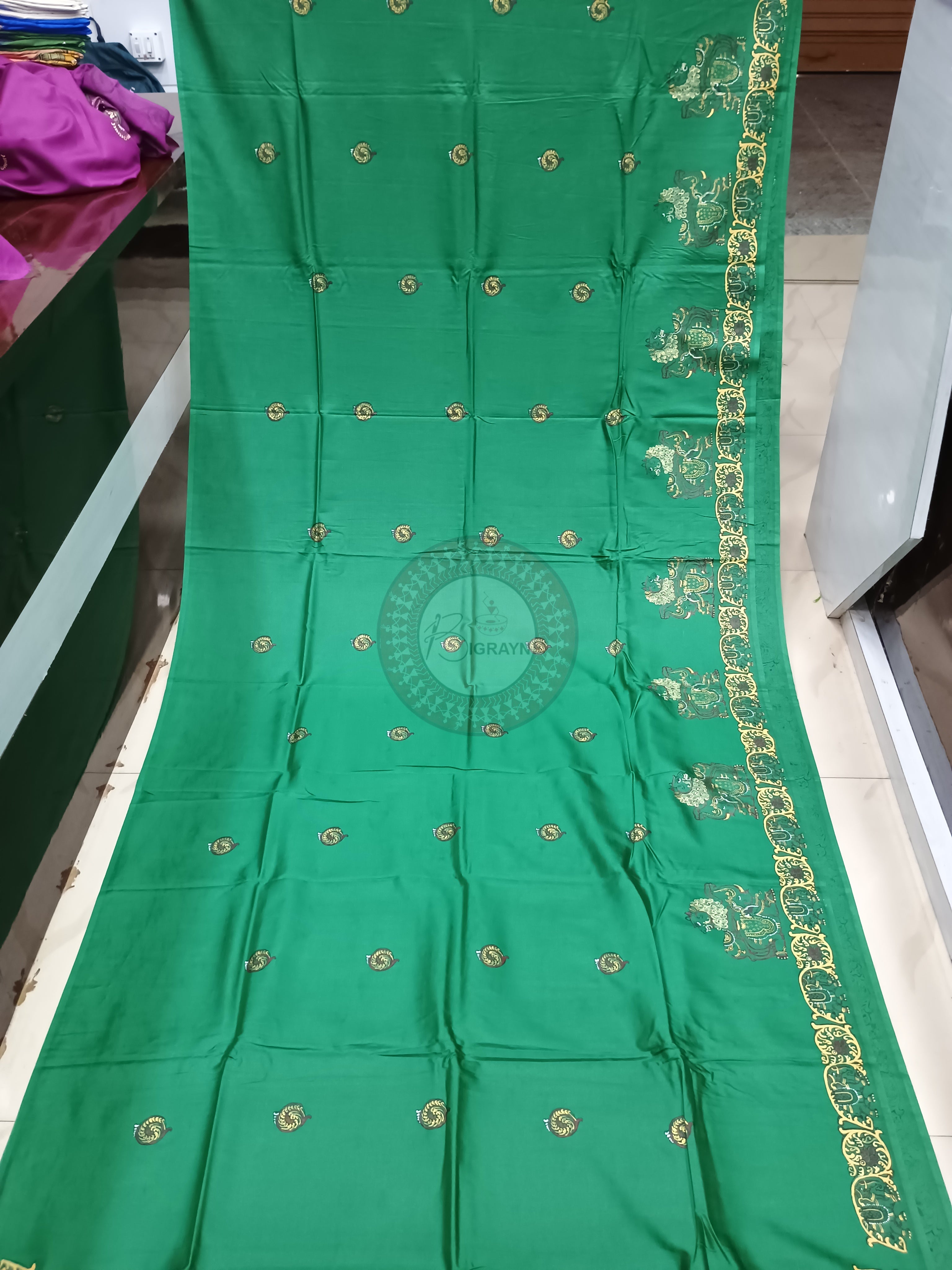 Green Konark Wheel Theme Pattachitra Khadi Silk Saree