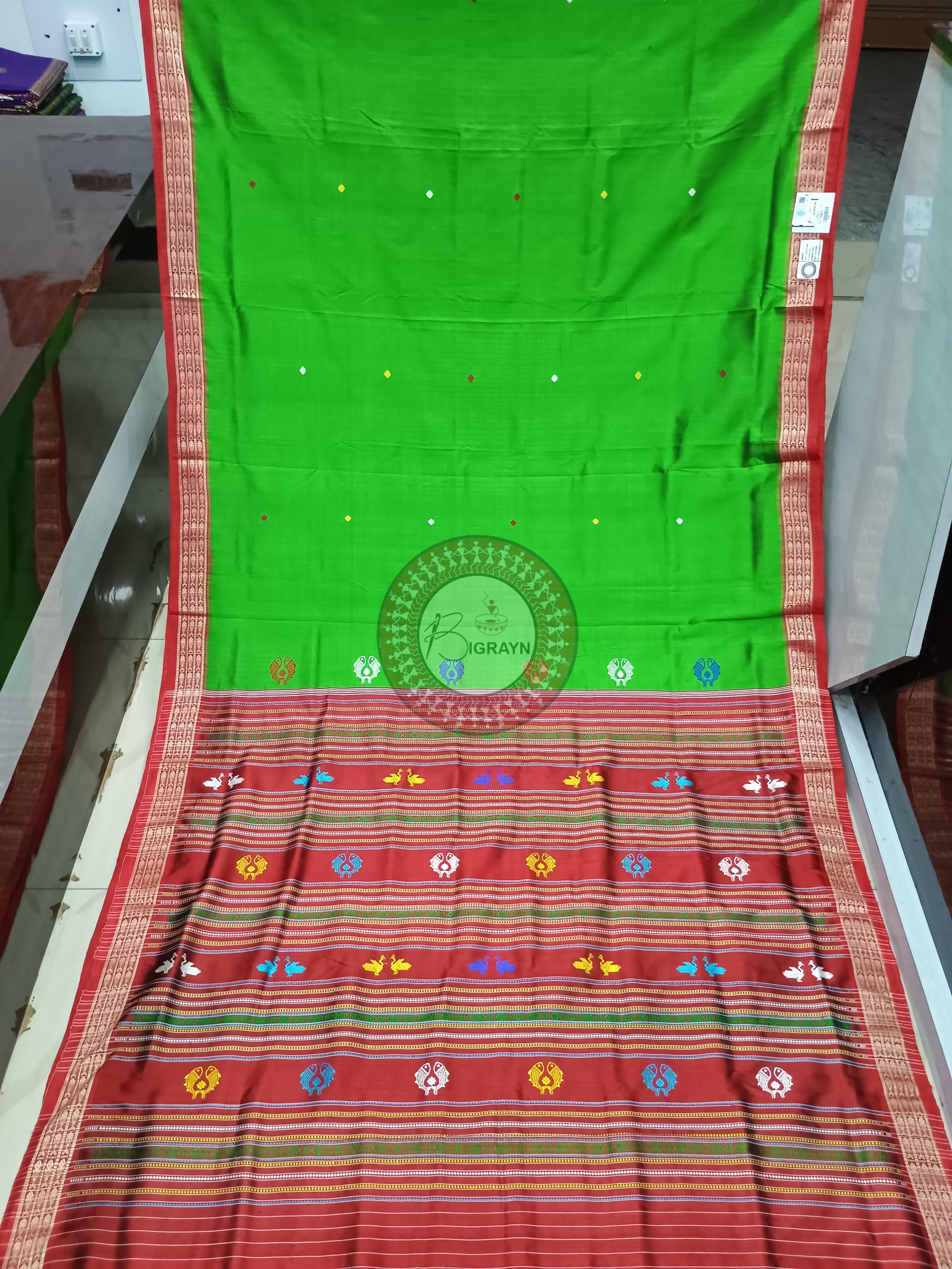 Traditional Khandua silk saree from Odisha with green and red ikat patterns, handwoven in Nuapatna